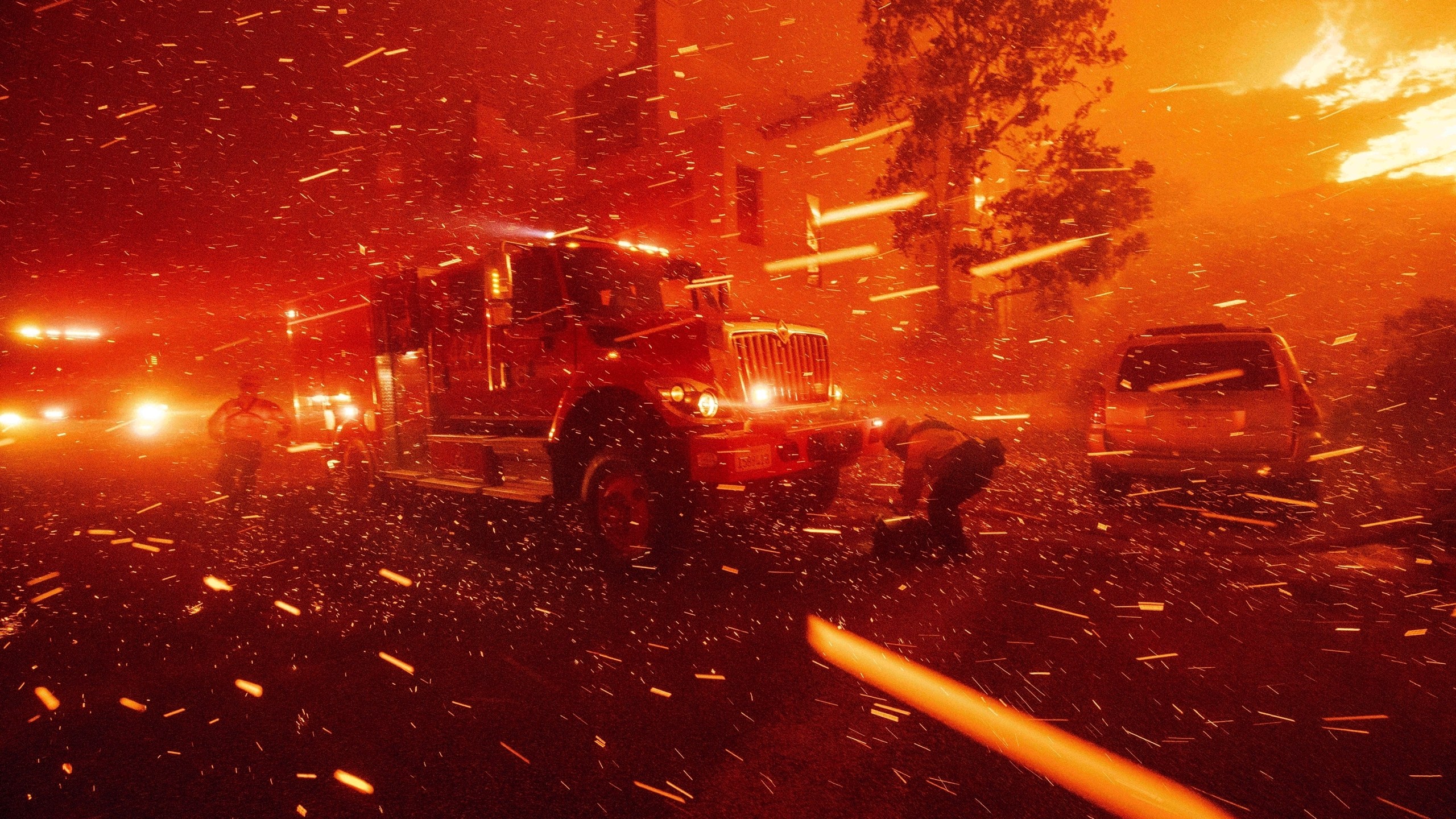 FILE - Firefighters battle the Franklin Fire in Malibu, Calif., Dec. 10, 2024. (AP Photo/Ethan Swope)