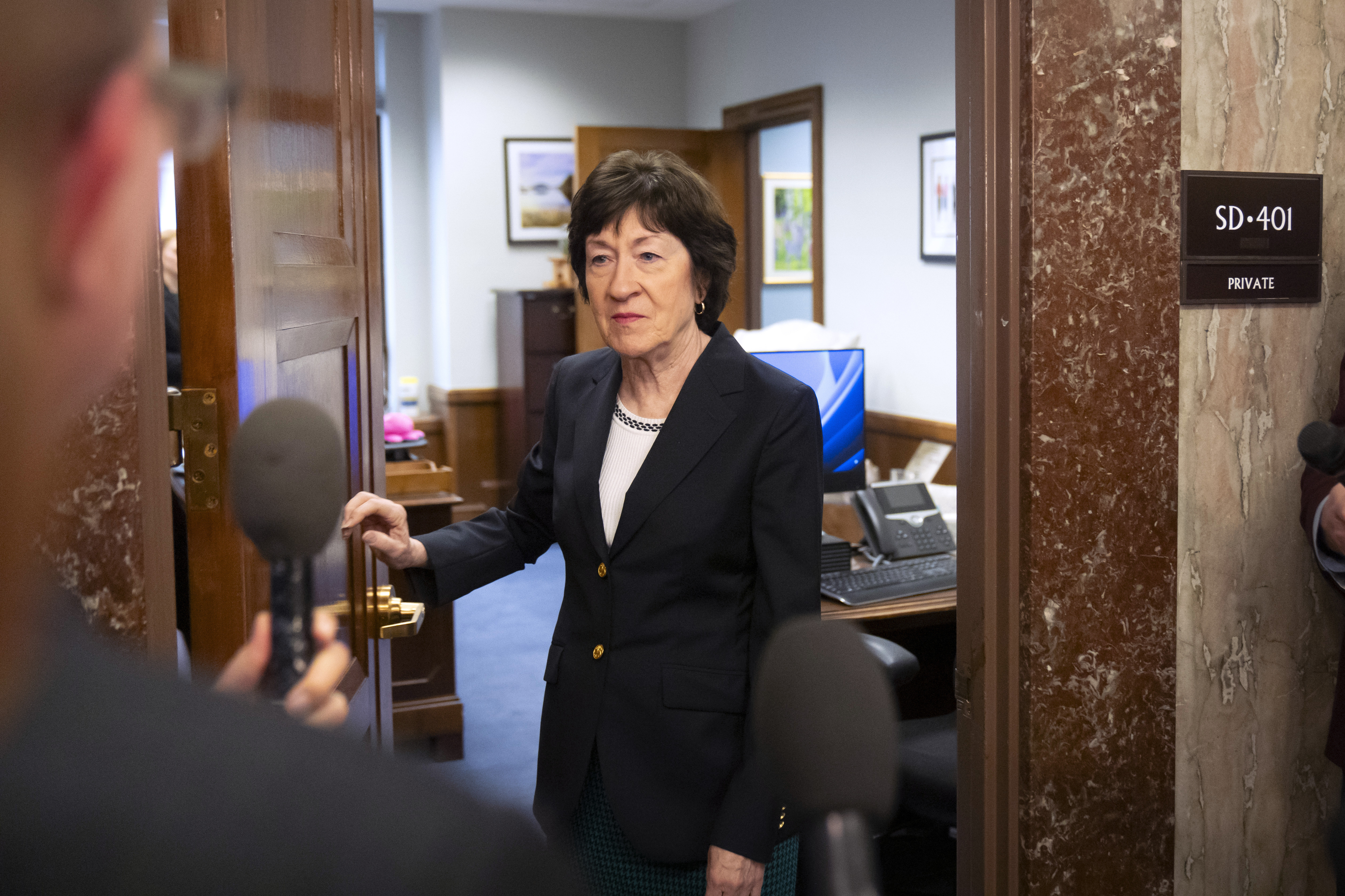 Sen. Susan Collins, R-Maine, speaks with reporters after meeting with Pete Hegseth, President-elect Donald Trump's choice to be defense secretary, on Capitol Hill, Wednesday, Dec. 11, 2024, in Washington. (AP Photo/Mark Schiefelbein)