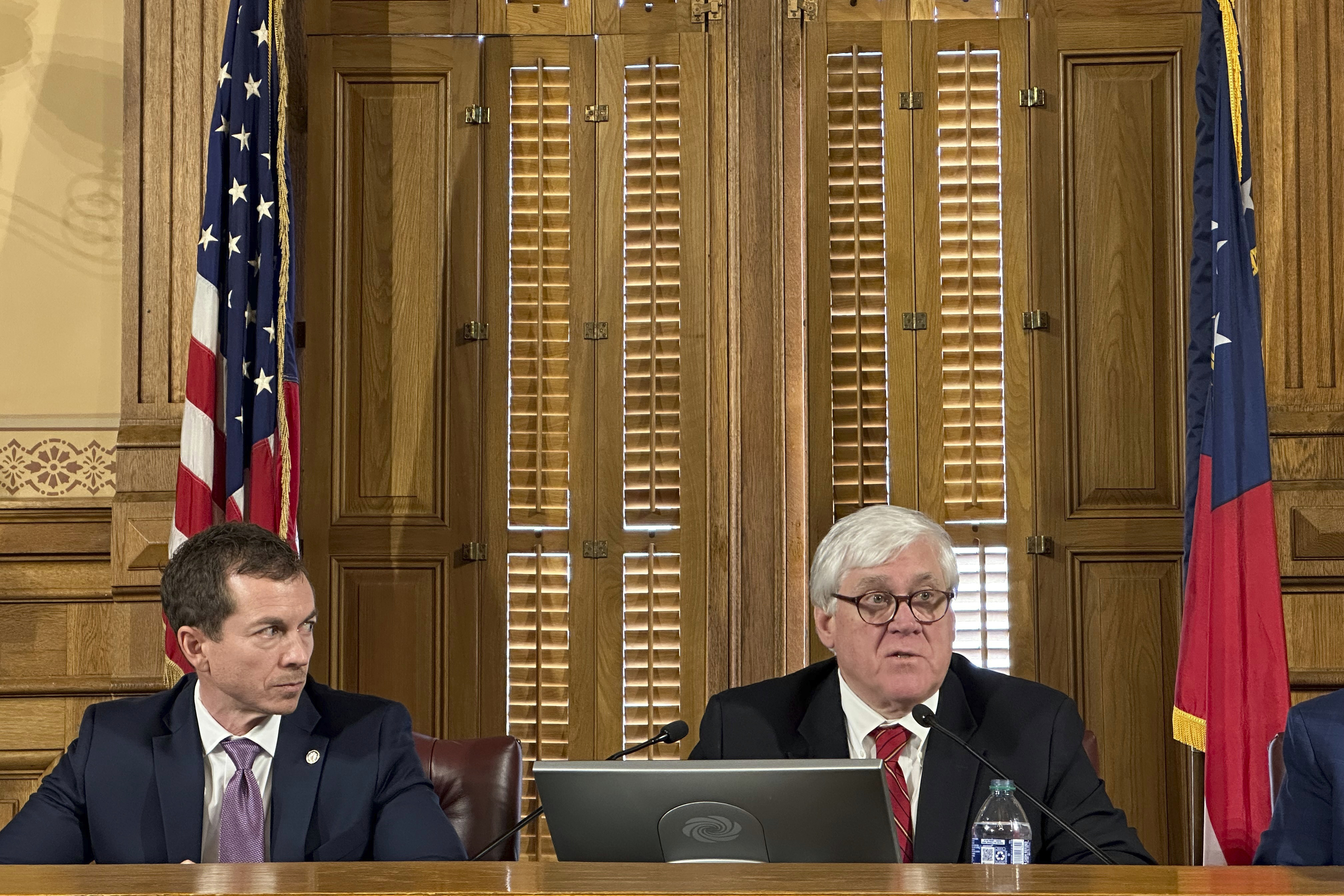 FILE - Georgia state Sen. Bill Cowsert, R-Athens, right, speaks as state Sen Greg Dolezal, R-Cumming, looks on, Friday, Feb. 9, 2024, at the Georgia Capitol in Atlanta, during the first meeting of a state Senate committee to investigate Fulton County District Attorney Fani Willis. (AP Photo/Jeff Amy, File)