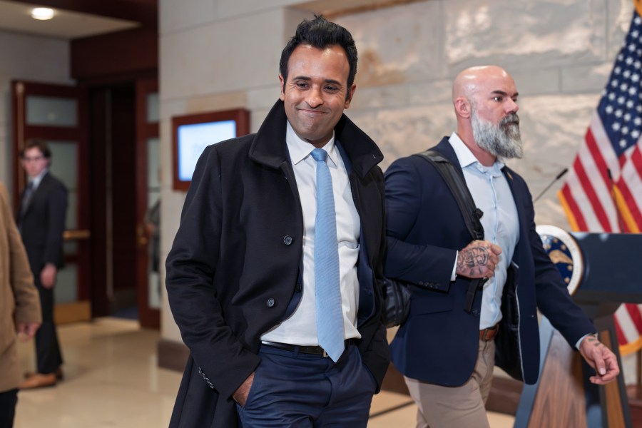 Vivek Ramaswamy arrives at the Capitol in Washington, Thursday, Dec. 5, 2024, to meet with Speaker of the House Mike Johnson, R-La., and billionaire Elon Musk as they convene a meeting of the unofficial Department of Government Efficiency, or DOGE, as envisioned by President-elect Donald Trump. (AP Photo/J. Scott Applewhite)