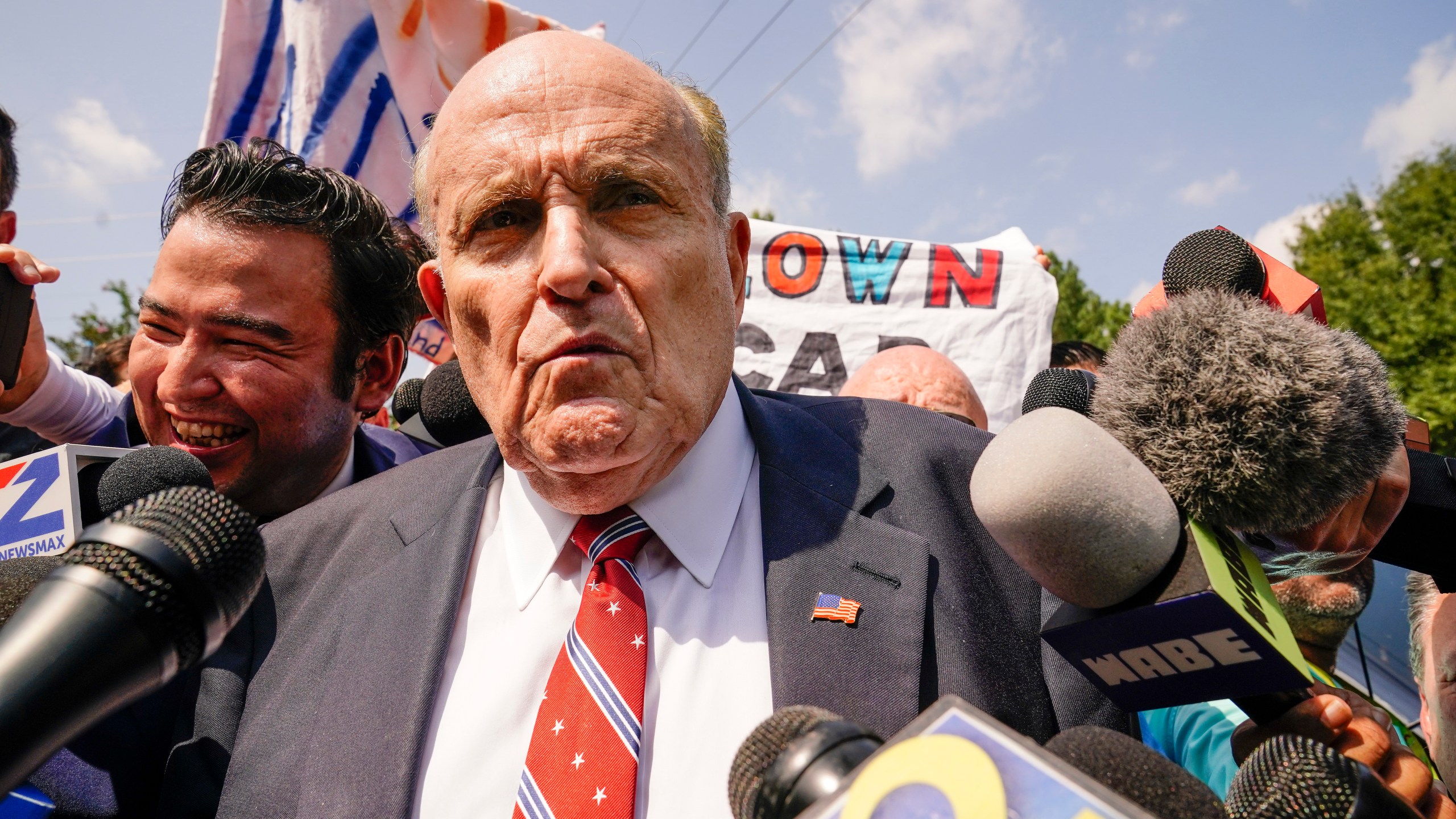 FILE - Rudy Giuliani speaks outside the Fulton County jail in Atlanta, on Wednesday, Aug. 23, 2023. (AP Photo/Brynn Anderson, File)