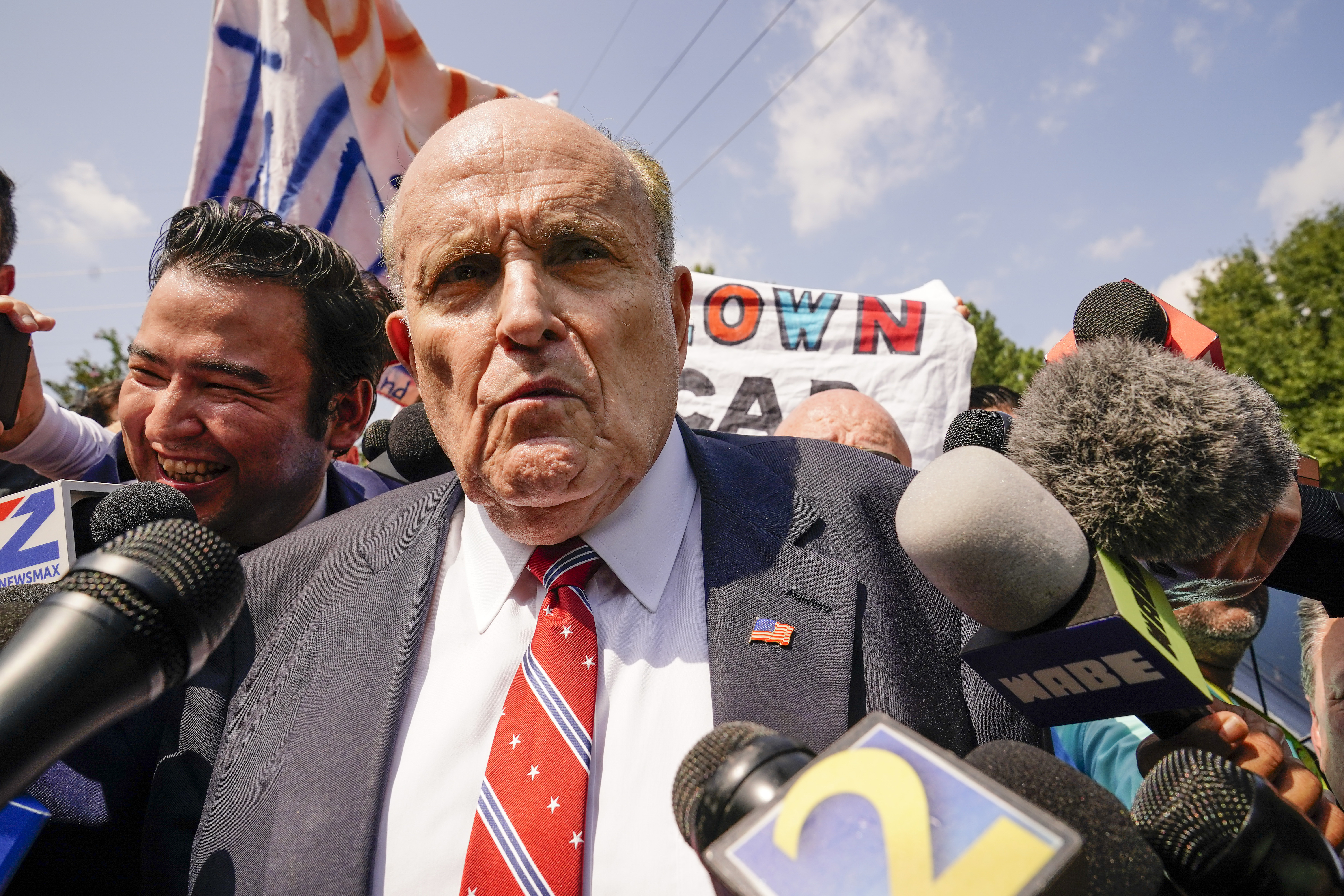 FILE - Rudy Giuliani speaks outside the Fulton County jail in Atlanta, on Wednesday, Aug. 23, 2023. (AP Photo/Brynn Anderson, File)