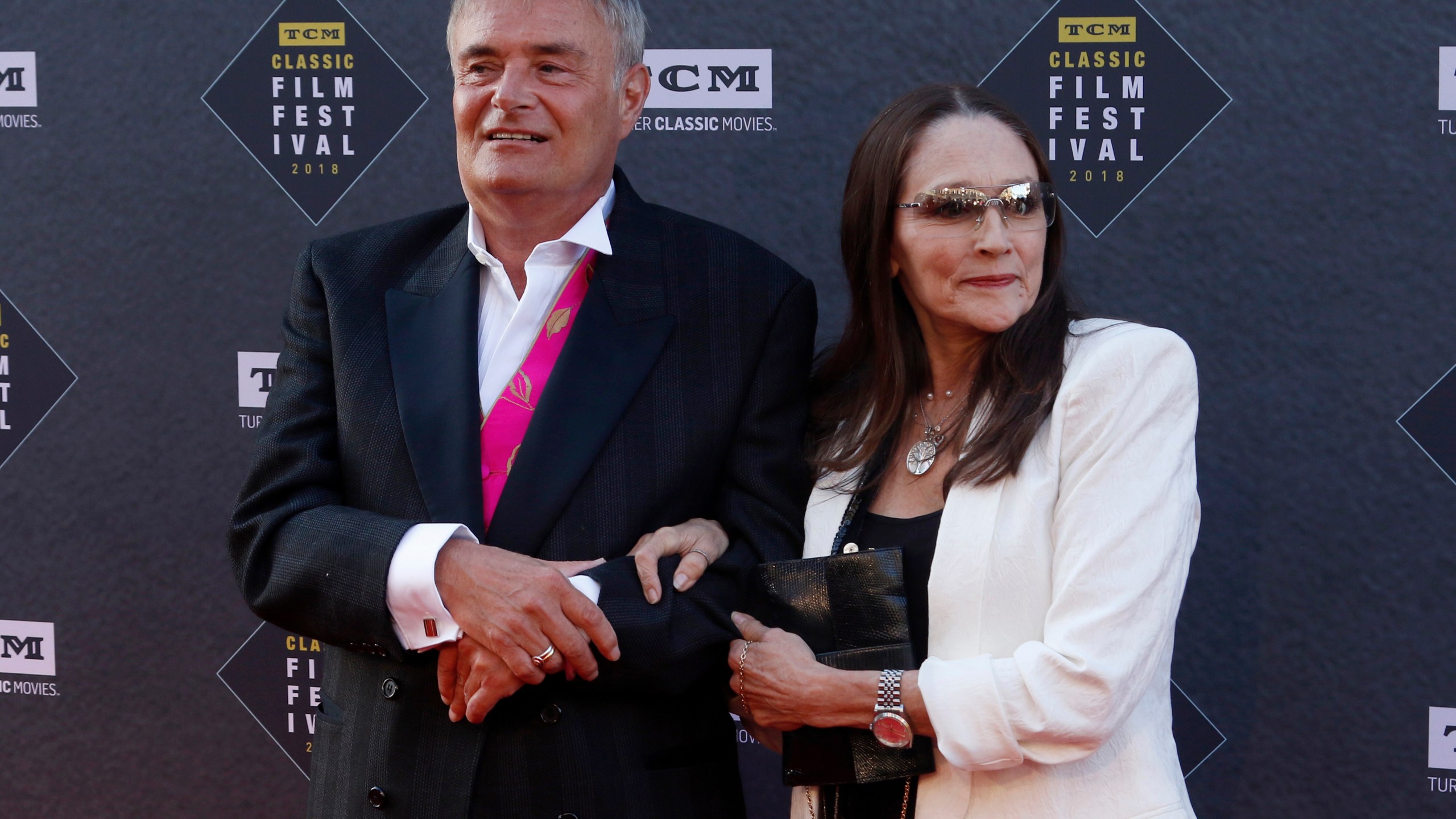 FILE - Leonard Whiting, left, and Olivia Hussey arrive at the screening of "The Producers" at the 2018 TCM Classic Film Festival Opening Night at the TCL Chinese Theatre on April 26, 2018, in Los Angeles. (Photo by Willy Sanjuan/Invision/AP, File)