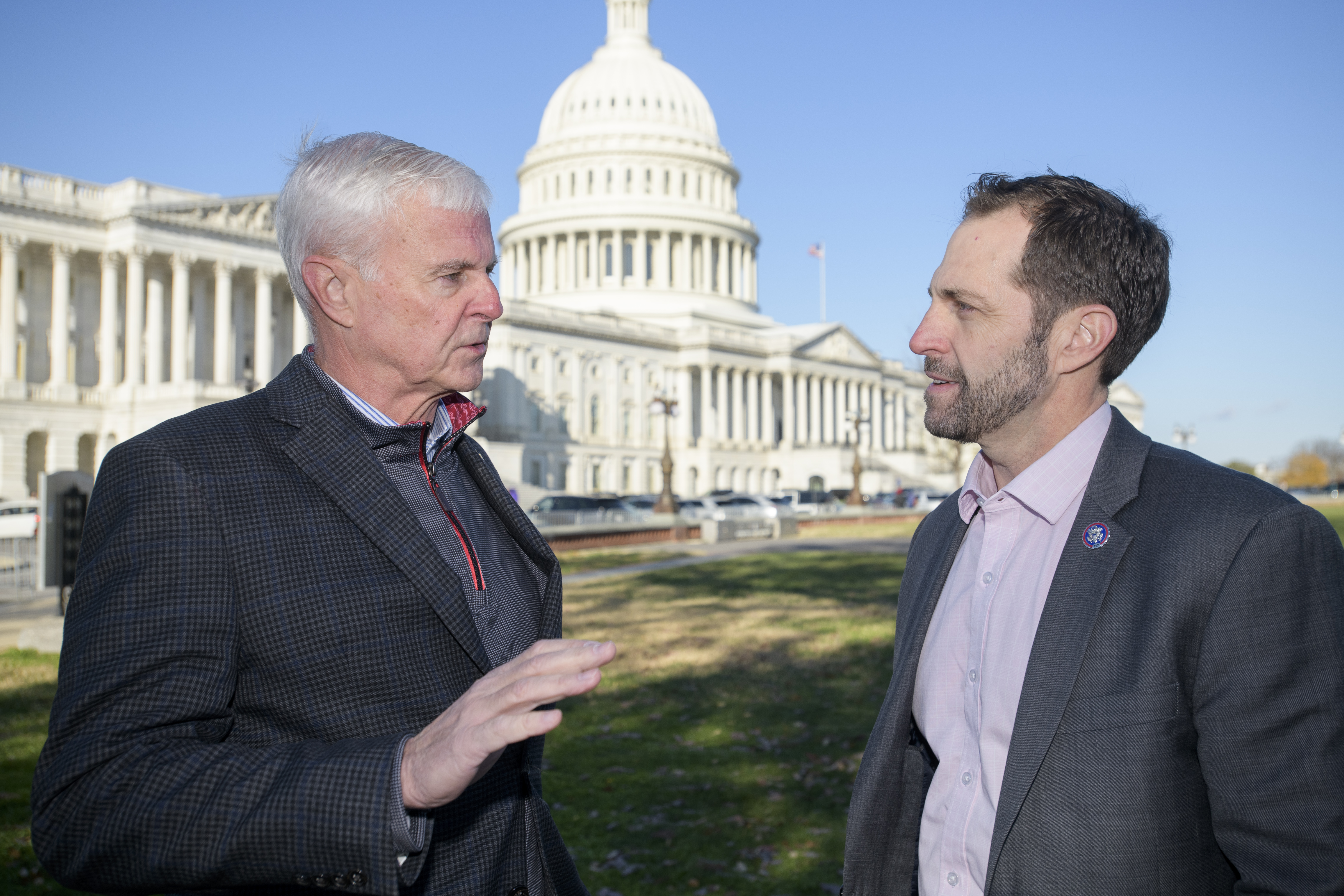 For Country Caucus co-chair Rep. Jason Crow, D-Colo., right, and Rep. Steve Womack, R-Ark., left, speak during a portrait session at the Capitol following a vote, Thursday, Dec. 12, 2024, in Washington. (AP Photo/Rod Lamkey, Jr.)