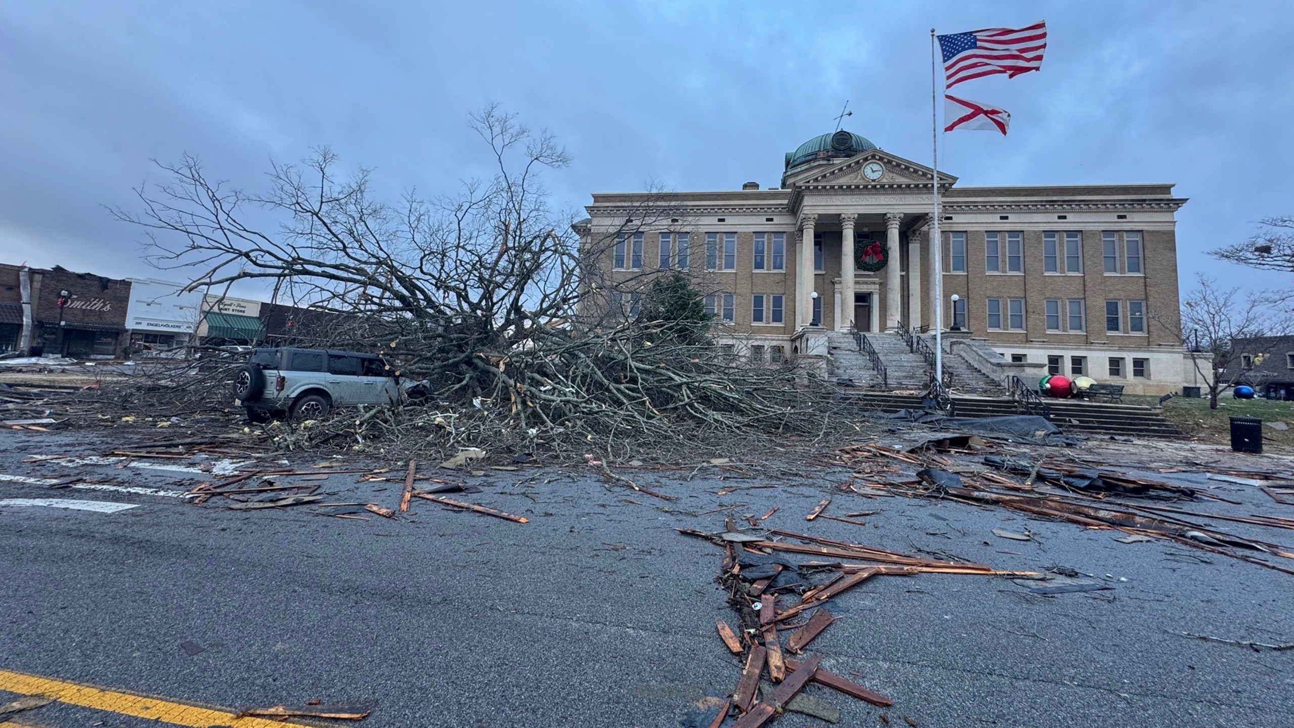 Damage from a storm through that rolled through the night before is seen at the heart of downtown on Sunday, Dec. 29, 2024, in Athens, Ala. (AP Photo/Lance George)