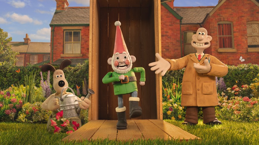 This image released by Netflix shows the characters Gromit, left, and Wallace, voiced by Ben Whitehead, right, with their robot knome, Norbot, voiced by Reece Shearsmith, in a scene from the film "Wallace & Gromit: Vengeance Most Fowl." (Netflix via AP)