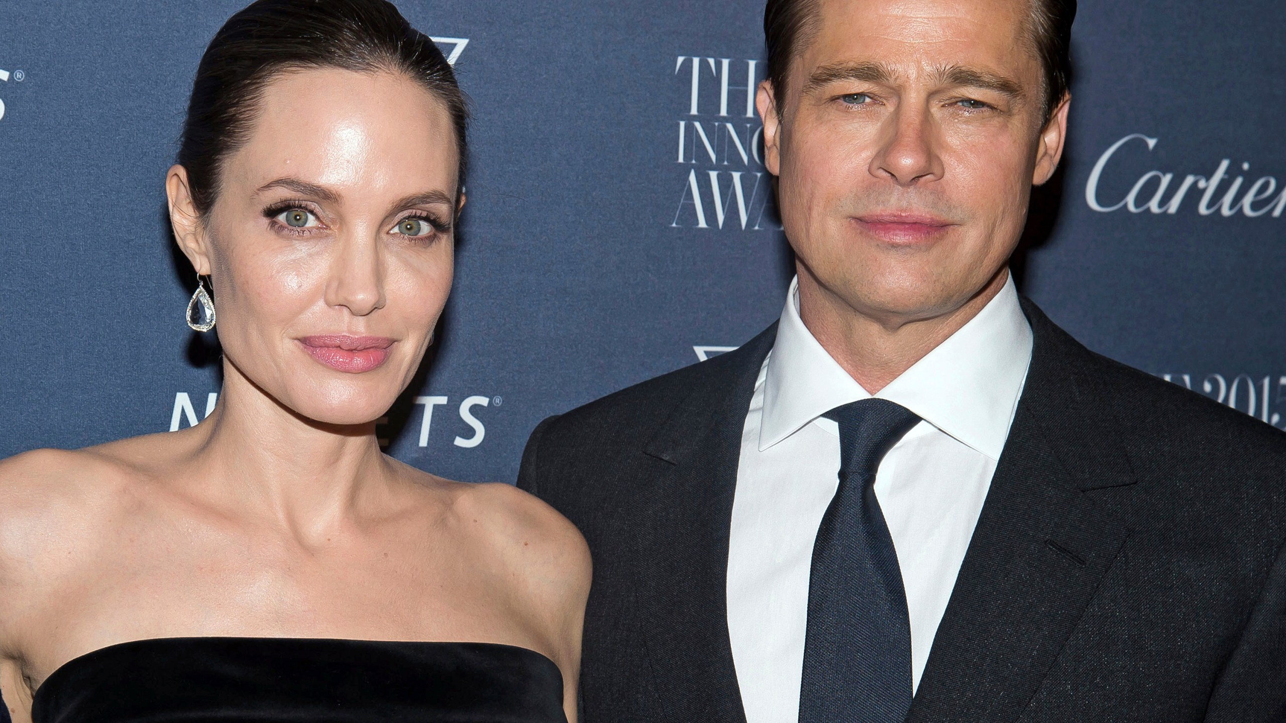 FILE - Angelina Jolie Pitt and Brad Pitt pose for a photo at the WSJ Magazine Innovator Awards 2015 at The Museum of Modern Art in New York, on Nov. 4, 2015. (Photo by Charles Sykes/Invision/AP, File)