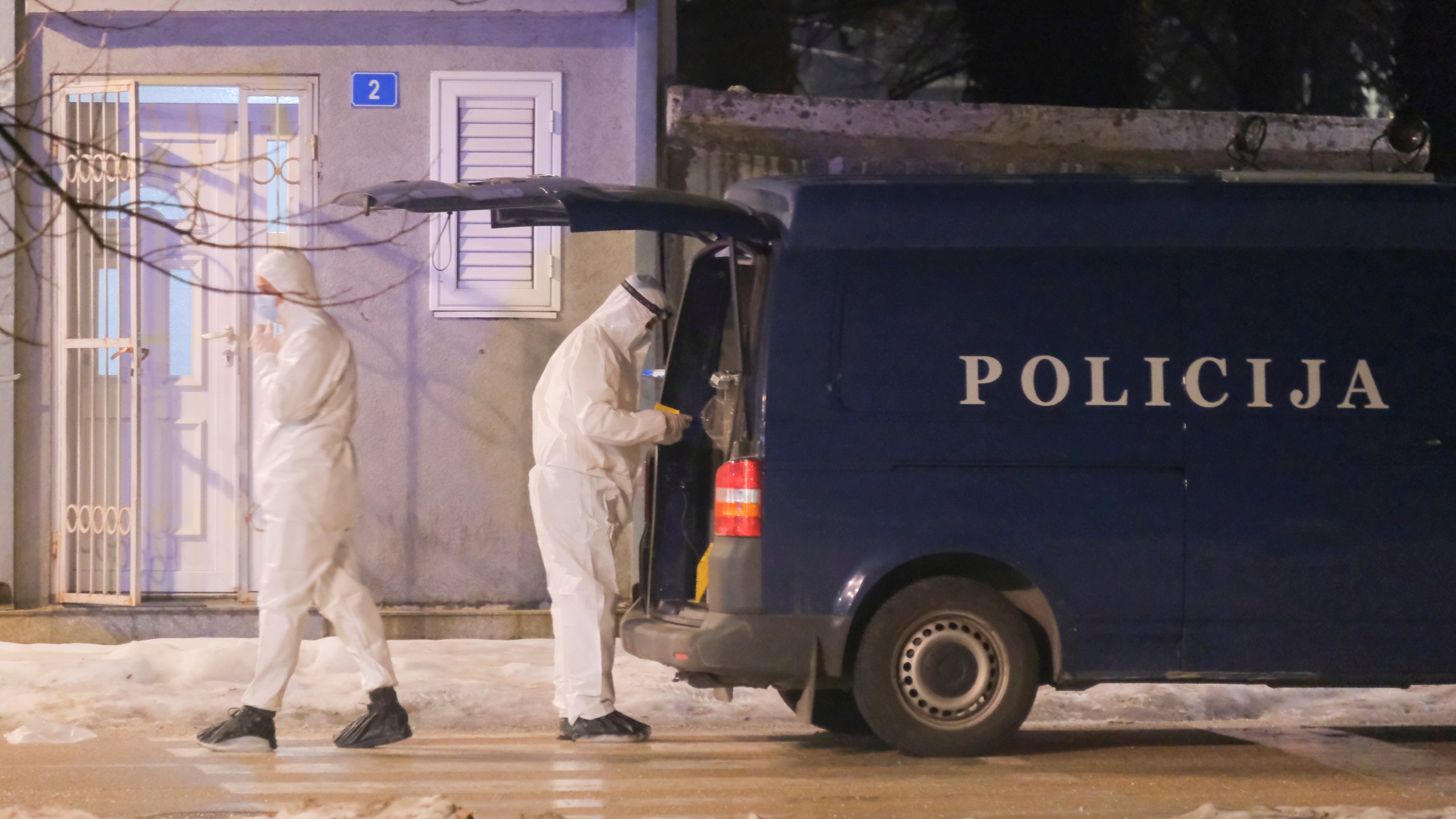 Police investigators work at the site of a shooting in Cetinje, 36 kilometers (22 miles) west of Podogrica, Montenegro, Wednesday, Jan 1, 2025. (AP Photo/Risto Bozovic)