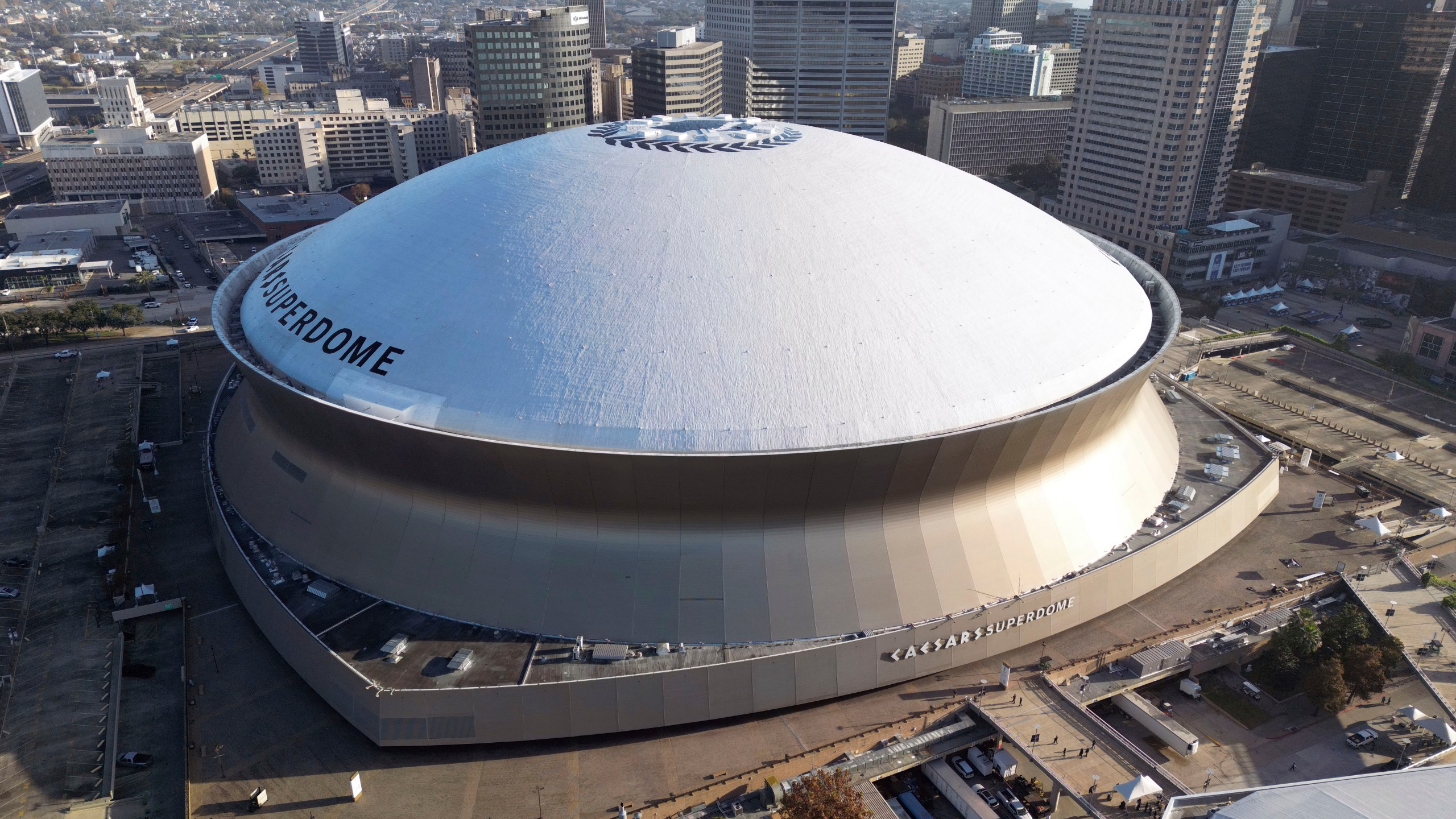 FILE - An aerial overall exterior general view of Caesars Superdome with the New Orleans skyline in the background is seen in New Orleans, Dec. 15, 2024. (AP Photo/Tyler Kaufman, File)