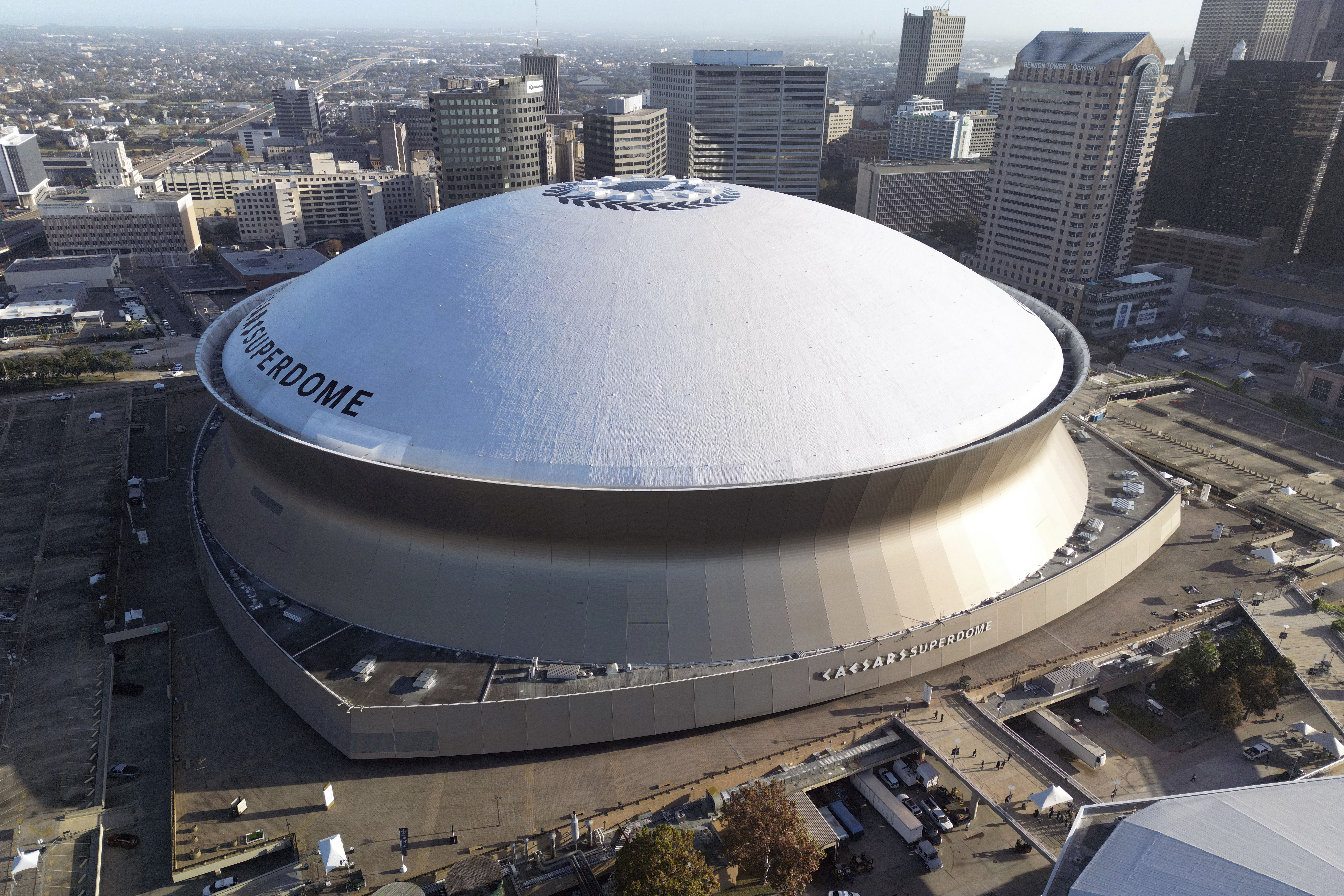 FILE - An aerial overall exterior general view of Caesars Superdome with the New Orleans skyline in the background is seen in New Orleans, Dec. 15, 2024. (AP Photo/Tyler Kaufman, File)