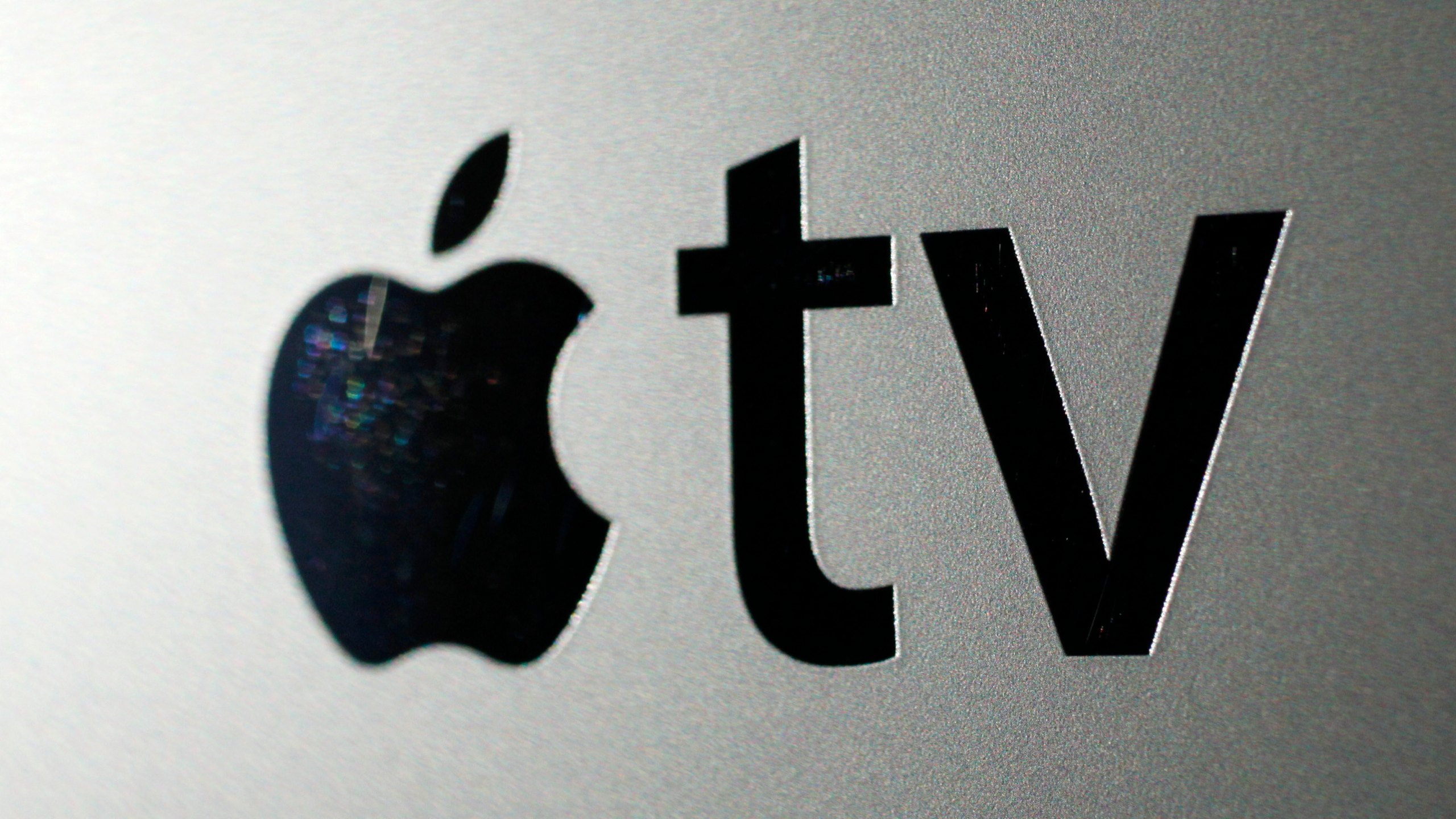 FILE - The logo for an Apple TV converter is seen on Oct. 6, 2010, in New York. (AP Photo/Mark Lennihan, File)