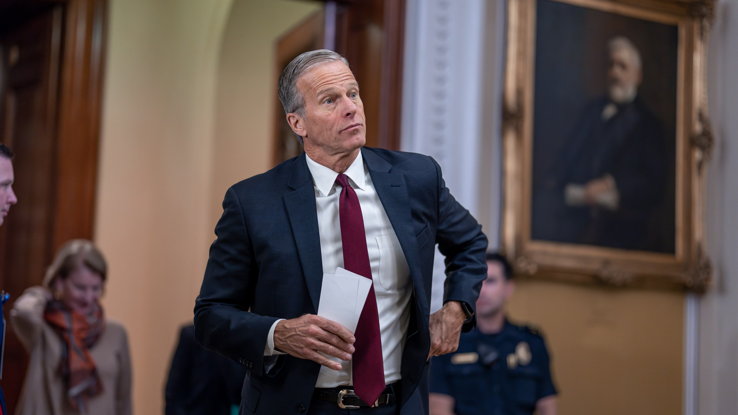 Senate Minority Whip John Thune, R-S.D., arrives to speak to reporters following a closed-door strategy session, at the Capitol in Washington, Tuesday, Dec. 17, 2024. (AP Photo/J. Scott Applewhite)