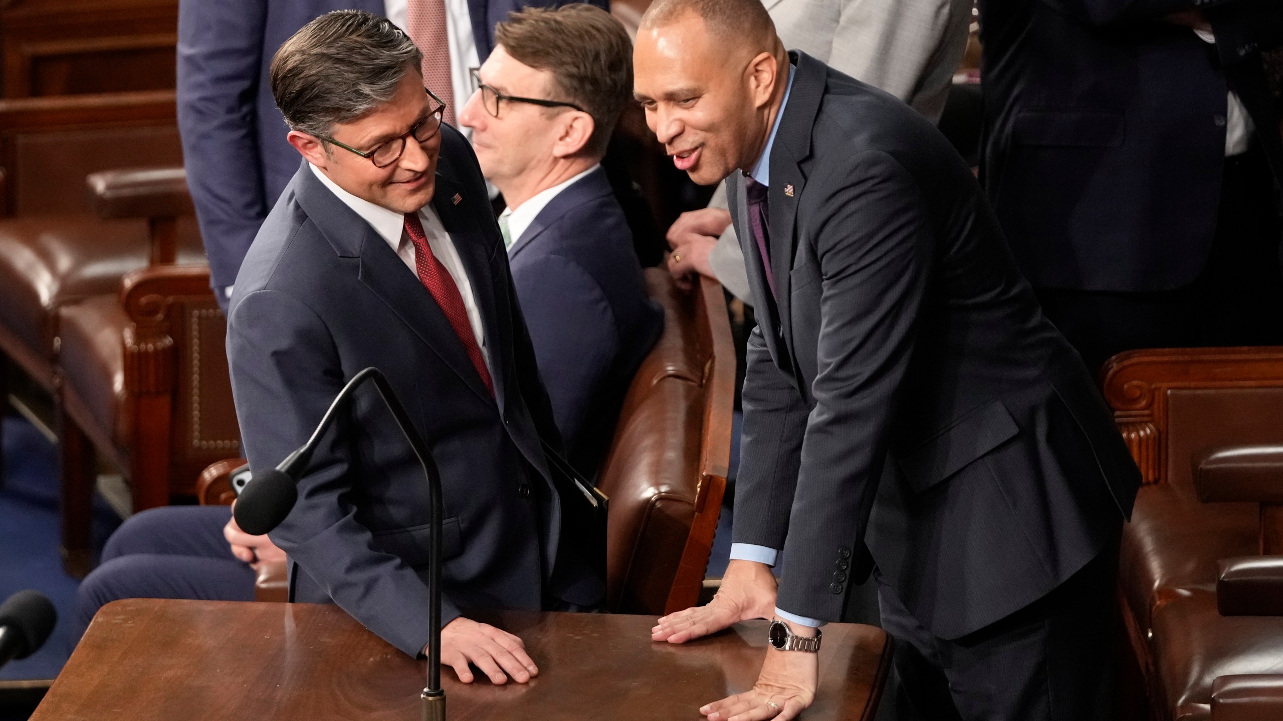 House Speaker Mike Johnson, R-La., left, speaks with House Minority Leader Hakeem as the House of Representatives meets to elect a speaker and convene the new 119th Congress at the Capitol in Washington, Friday, Jan. 3, 2025.(AP Photo/Mark Schiefelbein)