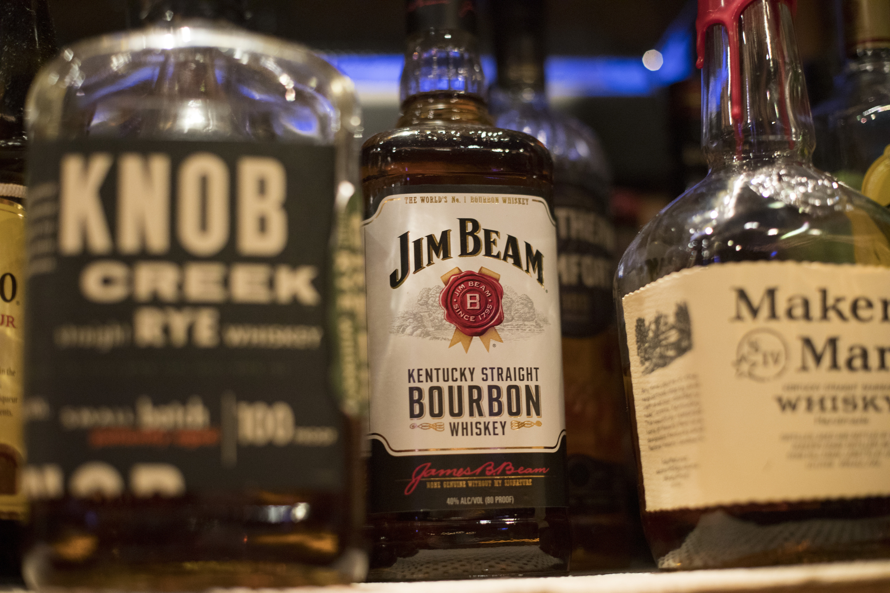 FILE - Jim Beam, Knob Creek and other alcohol bottles are pictured at a bar in Eagle, Colo., Dec. 25, 2018. (AP Photo/Jenny Kane, File)