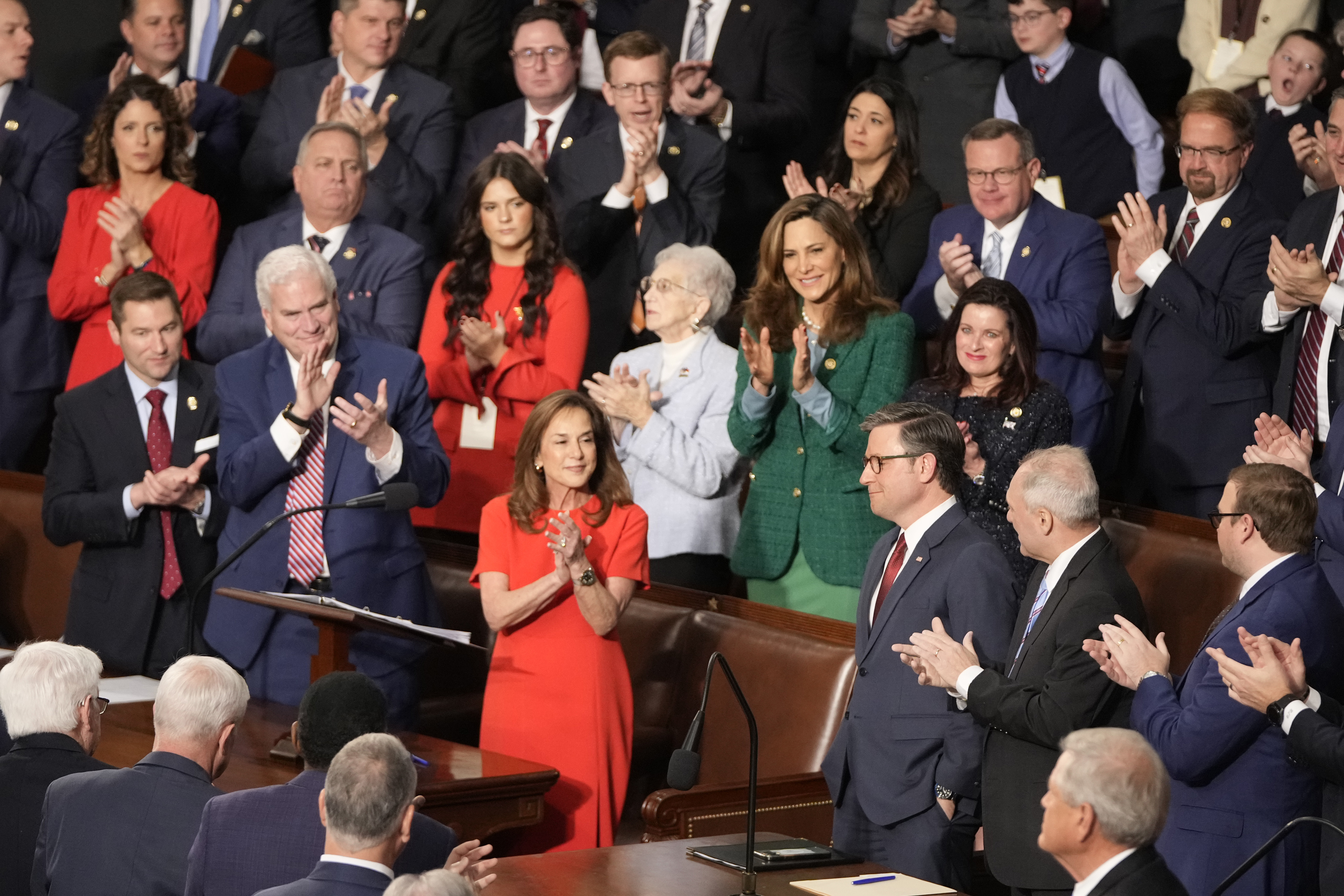 Rep. Lisa McClain, R-Mich., center left, and others applaud House Speaker Mike Johnson, R-La., as the House of Representatives meets to elect a speaker and convene the new 119th Congress at the Capitol in Washington, Friday, Jan. 3, 2025. (AP Photo/Mark Schiefelbein)