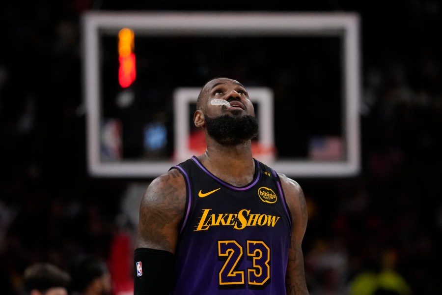 Los Angeles Lakers forward LeBron James (23) walks on the court during the second half of an NBA basketball game against the Houston Rockets in Houston, Sunday, Jan. 5, 2025. (AP Photo/Ashley Landis)