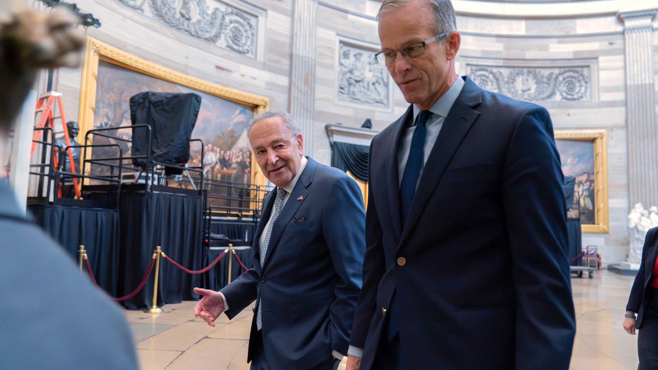 Senate Minority Leader Chuck Schumer, D-N.Y., left, and Senate Majority Leader John Thune, R-S.D., leads a Senate procession through the Rotunda to the House Chamber for a joint session of congress to confirm the Electoral College votes, at the Capitol on Monday, Jan. 6, 2025, in Washington. Walking behind her is Sen. Chuck Grassley R-Iowa. (AP Photo/Jose Luis Magana)