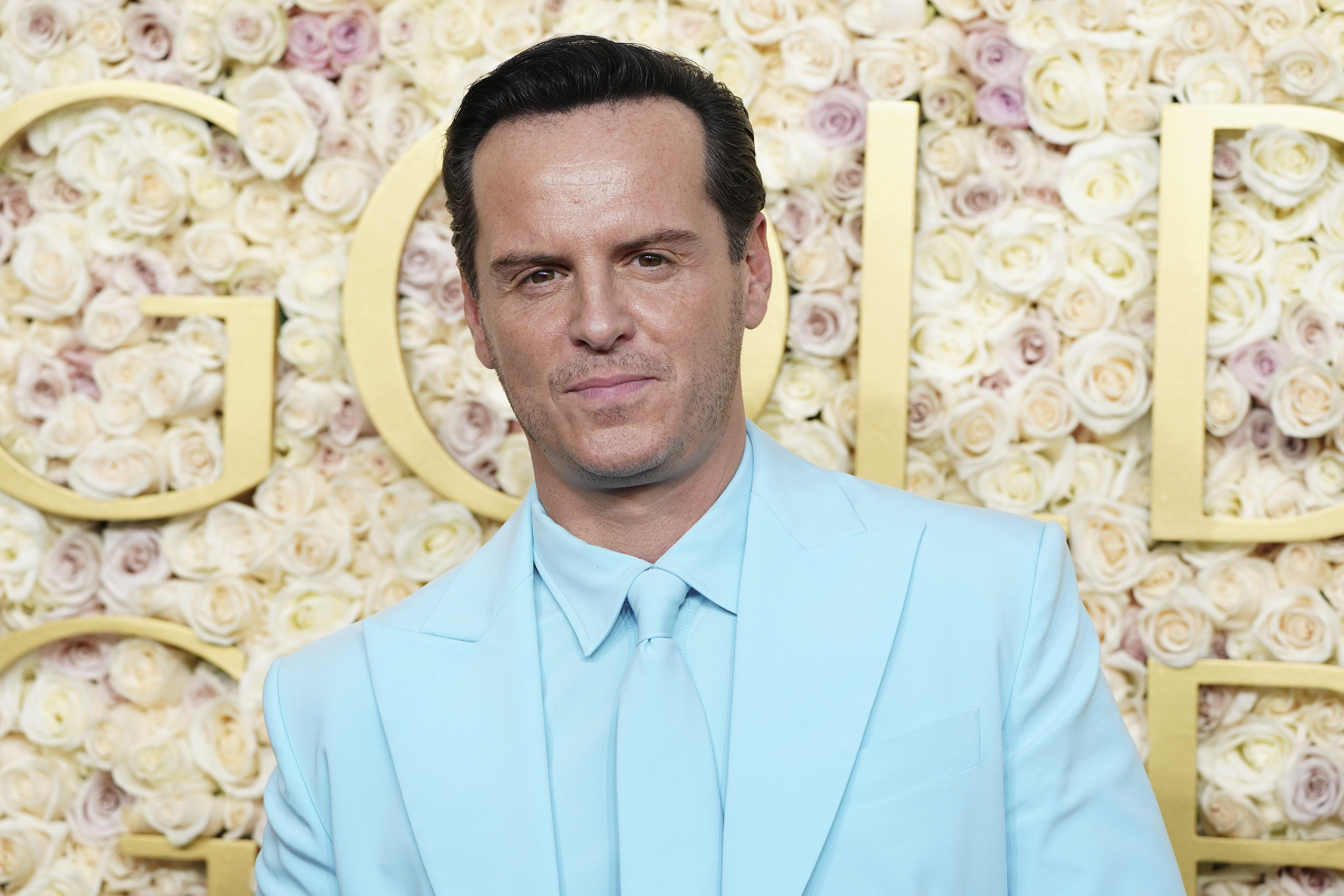 Andrew Scott arrives at the 82nd Golden Globes on Sunday, Jan. 5, 2025, at the Beverly Hilton in Beverly Hills, Calif. (Photo by Jordan Strauss/Invision/AP)