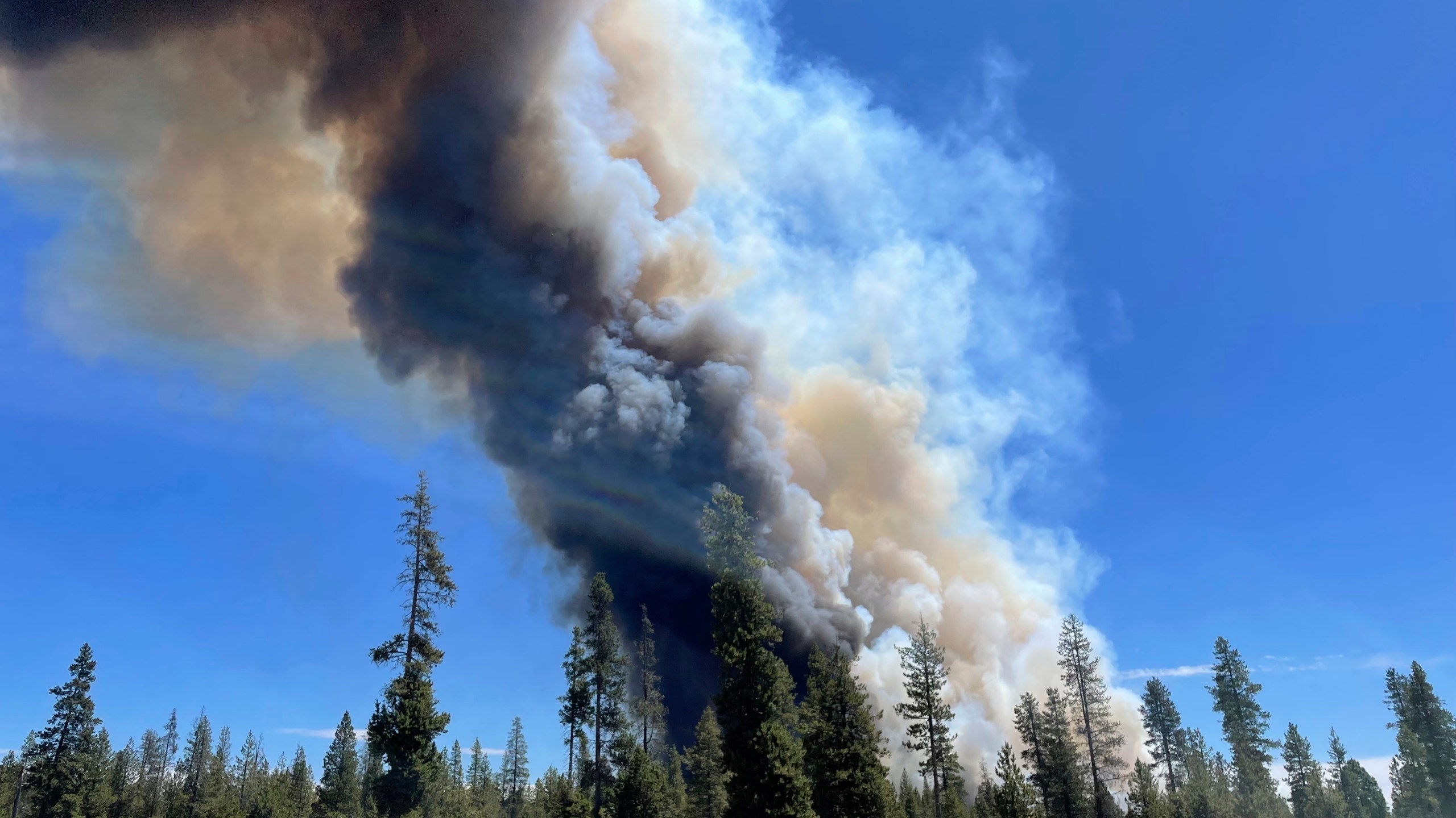 FILE - In this photo provided by the Deschutes County Sherriff's Office, smoke rises from a wildfire near La Pine, Ore., June 25, 2024. (Sgt. Kyle Kalambach/Deschutes County Sherriff's Office via AP, File)