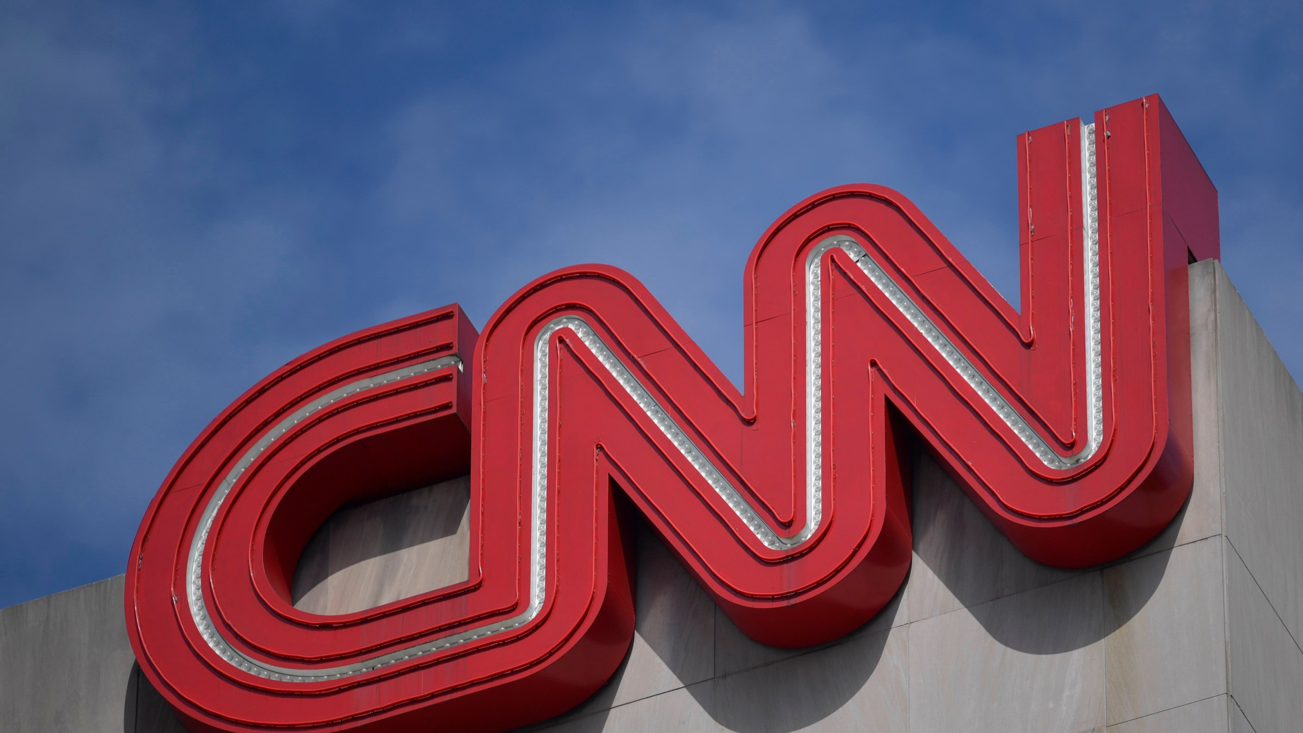 FILE - Signage is seen at the CNN Center in Atlanta on April 21, 2022. (AP Photo/Mike Stewart, File)