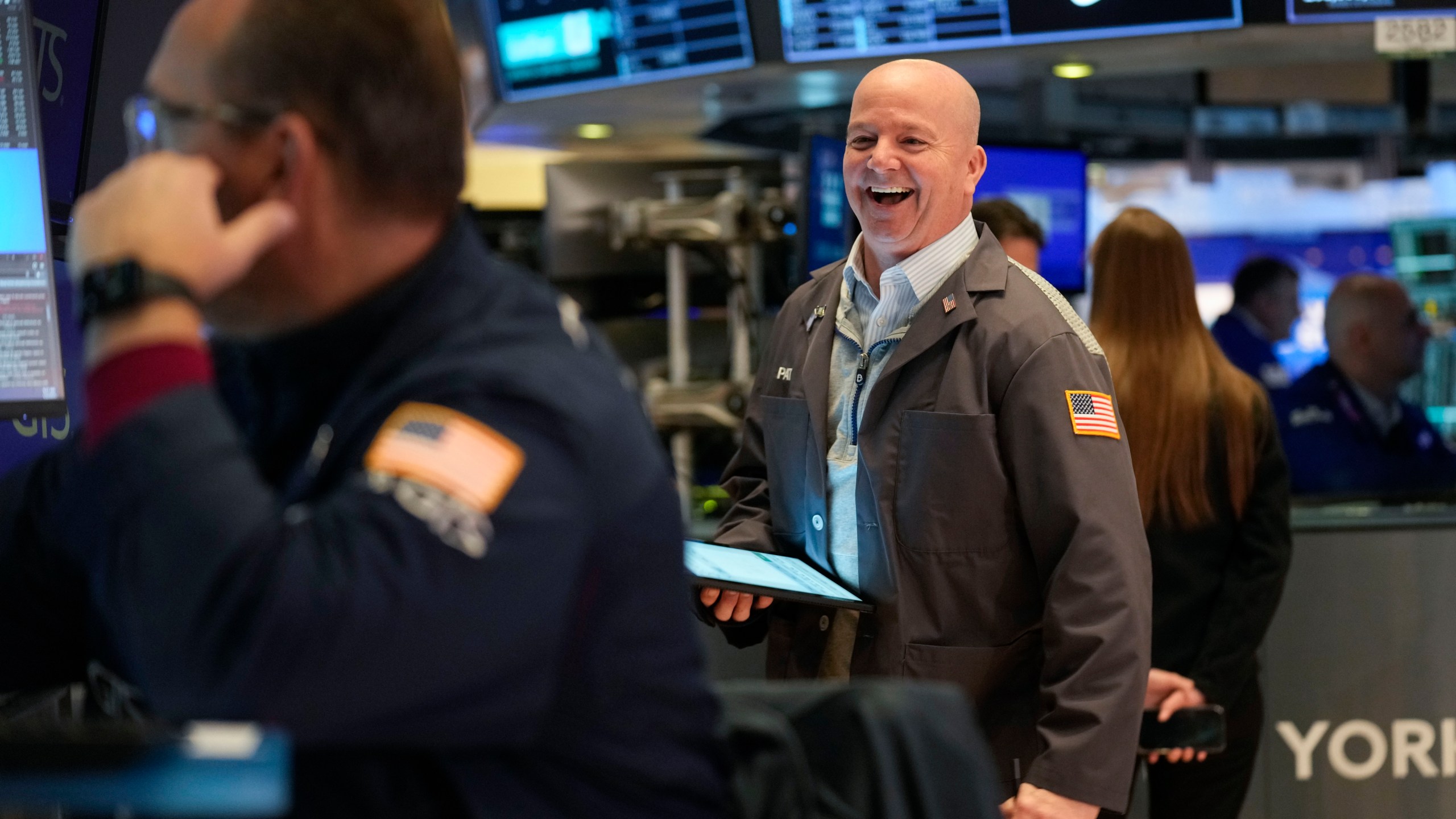 Traders work on the floor at the New York Stock Exchange in New York, Thursday, Jan. 2, 2025. (AP Photo/Seth Wenig)