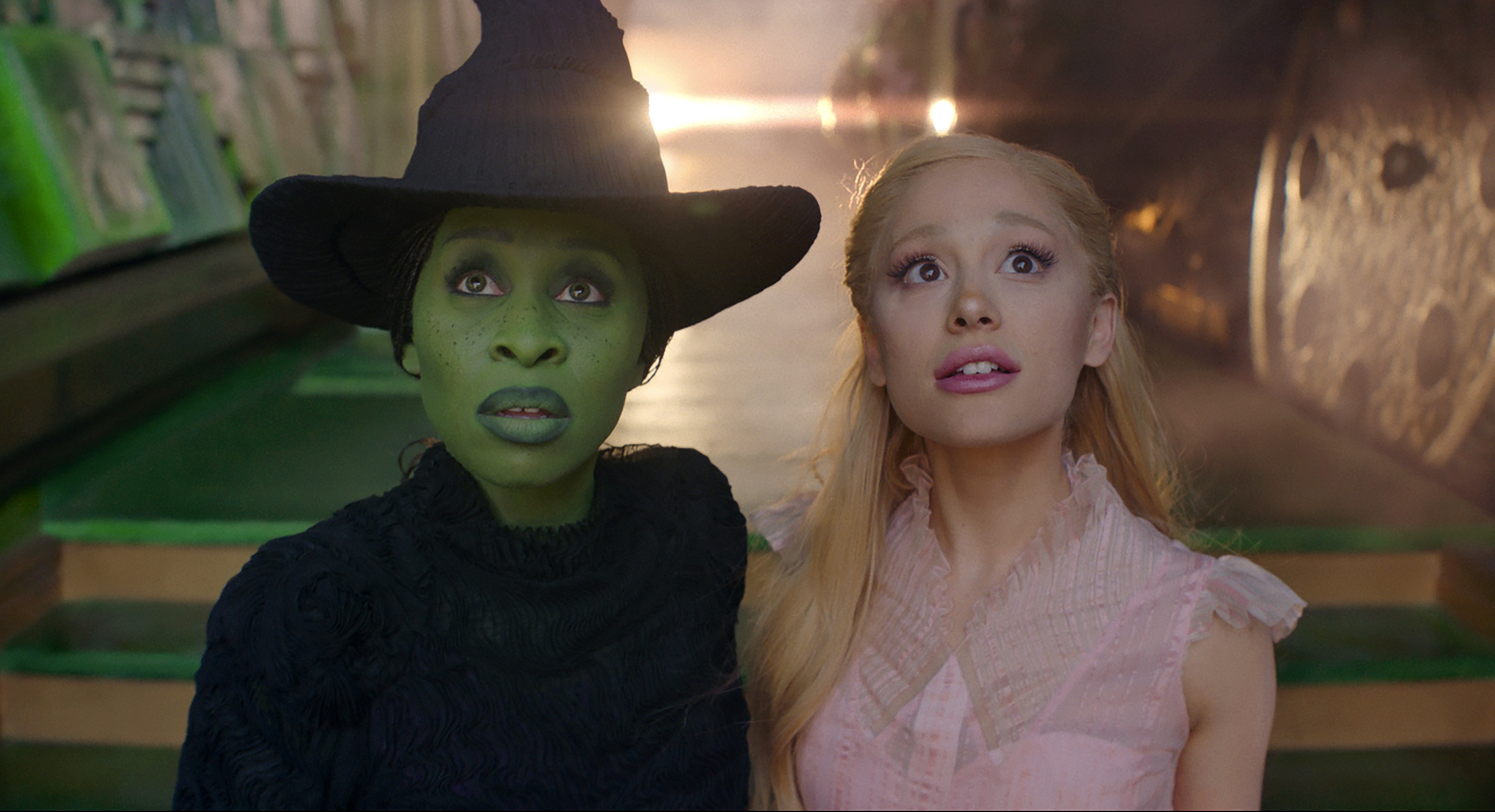 This image released by Universal Pictures shows Cynthia Erivo, left, and Ariana Grande in a scene from the film "Wicked." (Universal Pictures via AP)