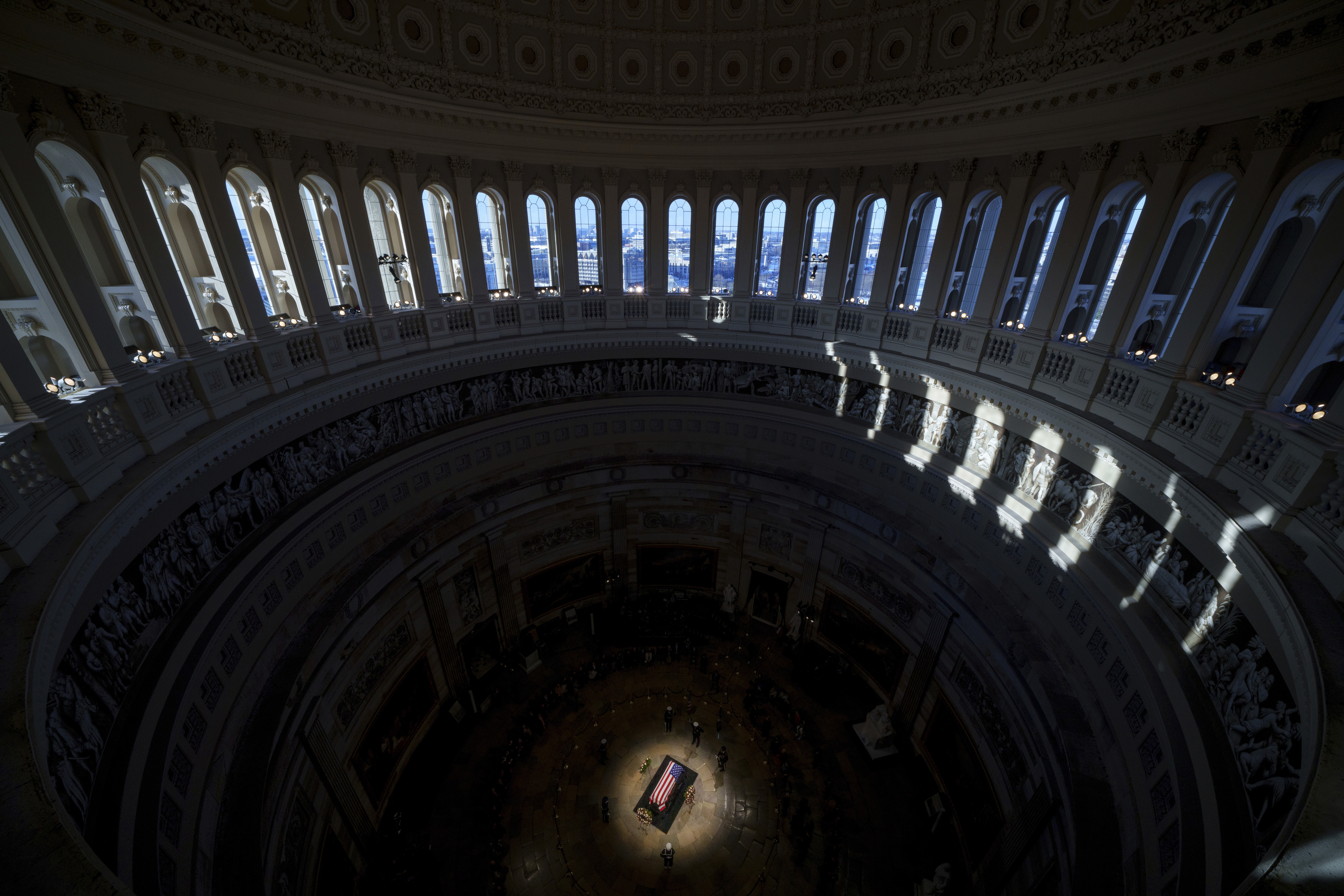 The flag-draped casket of former President Jimmy Carter lies in state at the rotunda of the U.S. Capitol, Wednesday, Jan. 8, 2025, in Washington. (Andrew Harnik/Pool via AP)