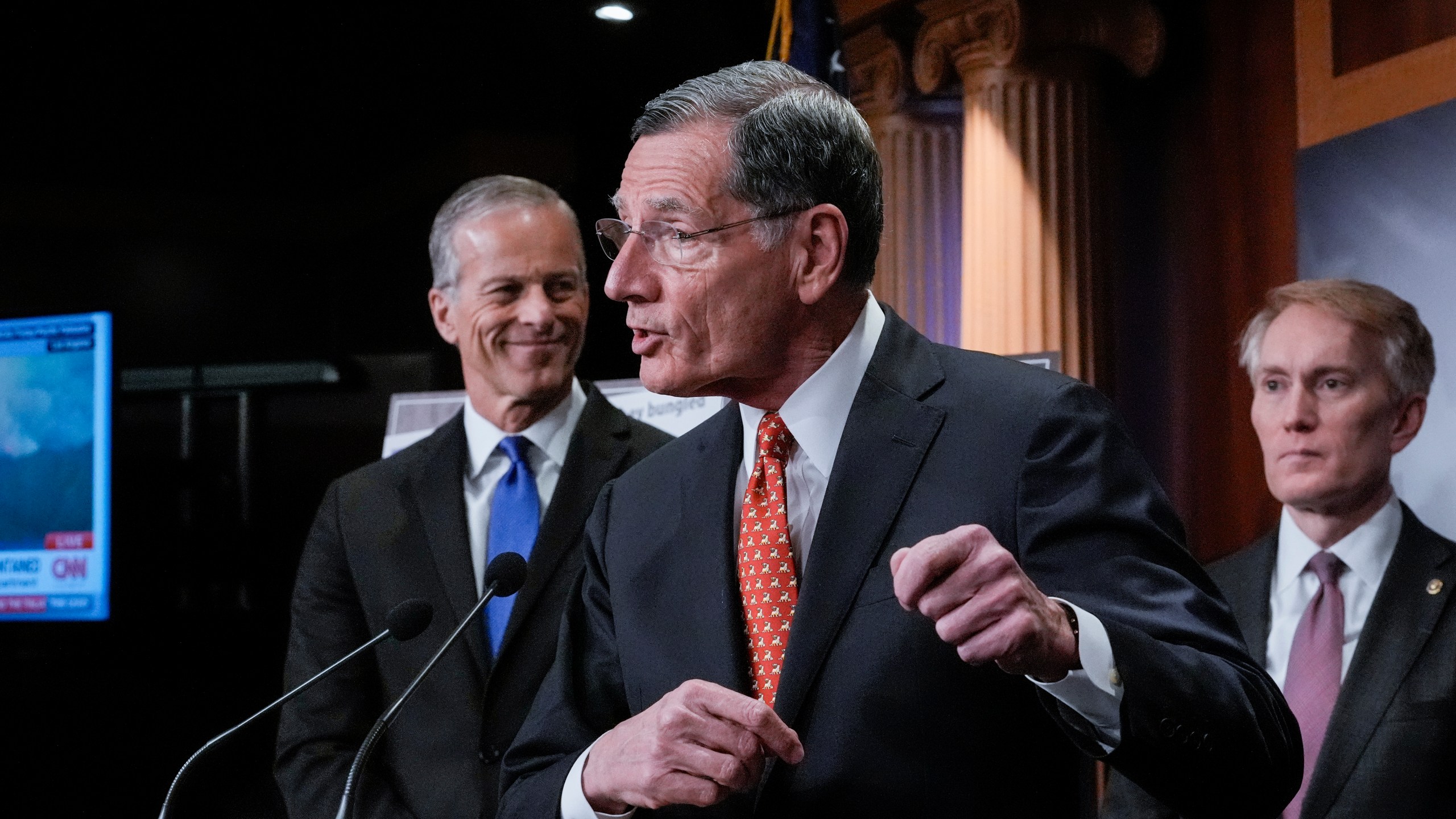 Senate Majority Whip John Barrasso, R-Wyo., center, flanked by Senate Majority Leader John Thune, R-S.D., left, and Sen. James Lankford, R-Okla., speaks to reporters about the Laken Riley Act, a bill to detain unauthorized immigrants who have been accused of certain crimes, at the Capitol in Washington, Thursday, Jan. 9, 2025. Georgia nursing student Laken Riley was killed last year by a Venezuelan man who entered the U.S. illegally and was allowed to stay to pursue his immigration case. (AP Photo/J. Scott Applewhite)