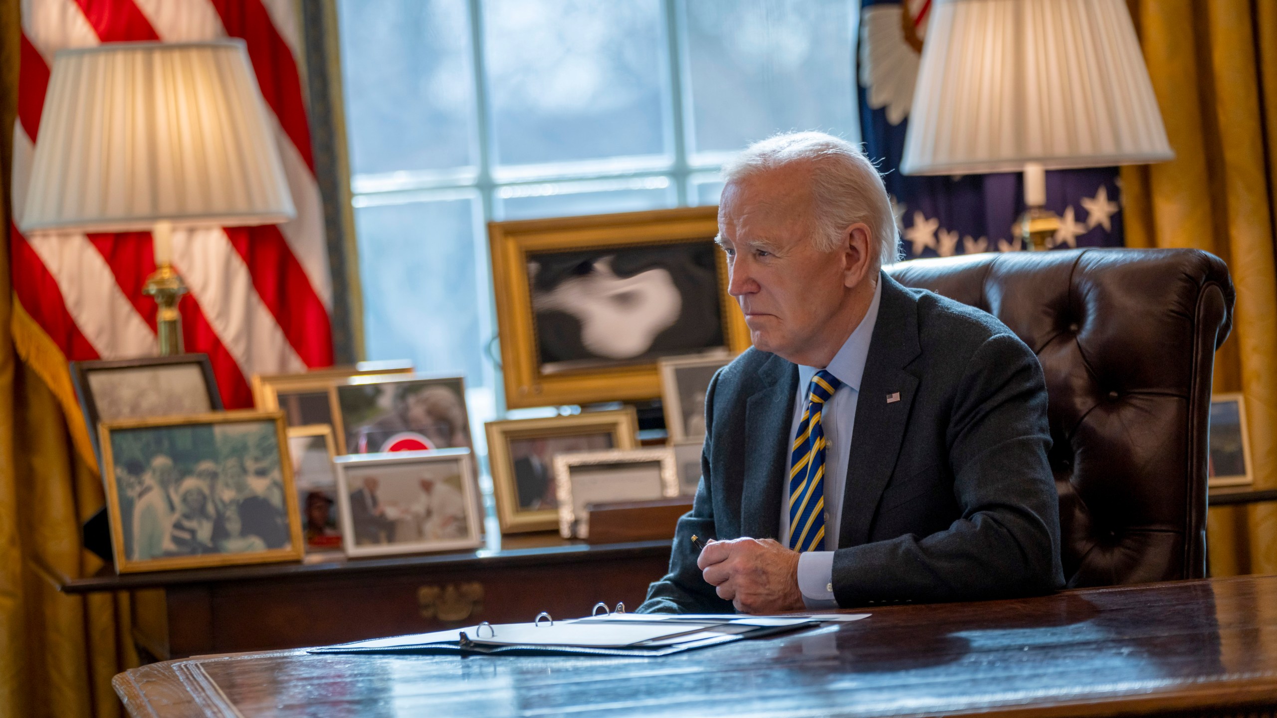 President Joe Biden listens during a briefing regarding the federal response to the spread of wildfires in the Los Angeles area, Friday, Jan. 10, 2025, in the Oval Office at the White House in Washington. (AP Photo/Ben Curtis)