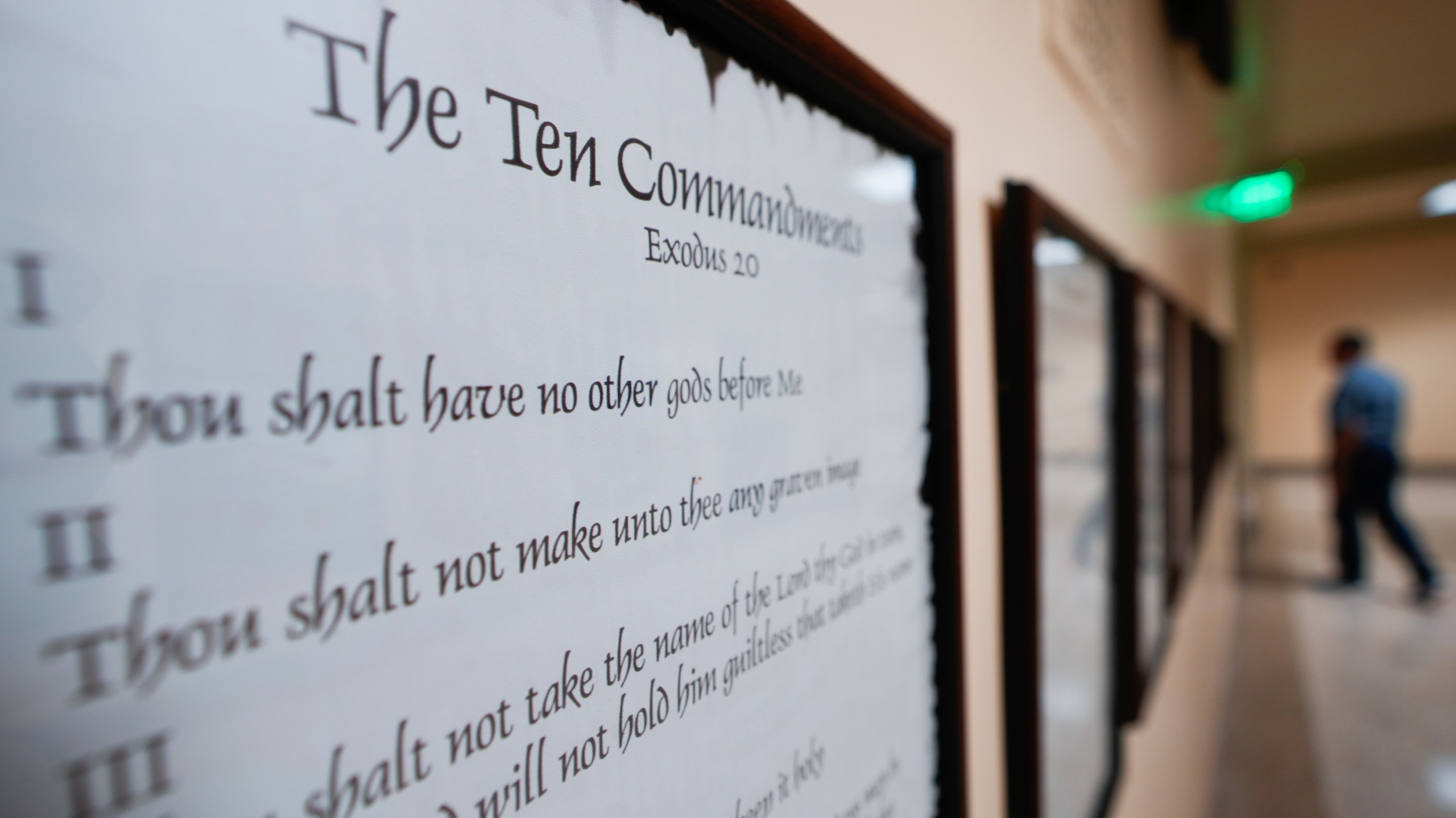 FILE - A copy of the Ten Commandments is posted along with other historical documents in a hallway of the Georgia Capitol, Thursday, June 20, 2024, in Atlanta. (AP Photo/John Bazemore, File)