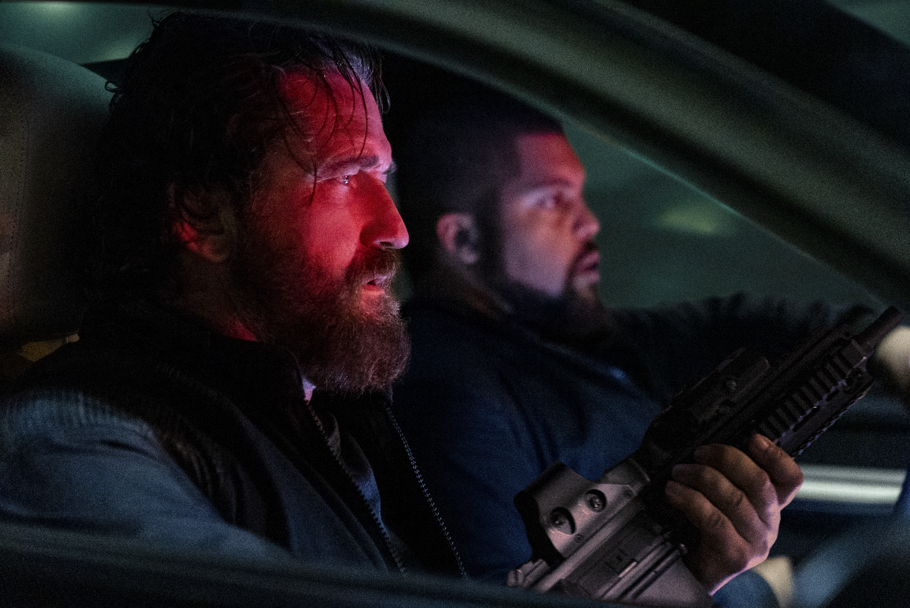 This image released by Lionsgate shows Gerard Butler, left, and O'Shea Jackson Jr. in a scene from "Den of Thieves 2: Pantera." (Rico Torres/Lionsgate via AP)