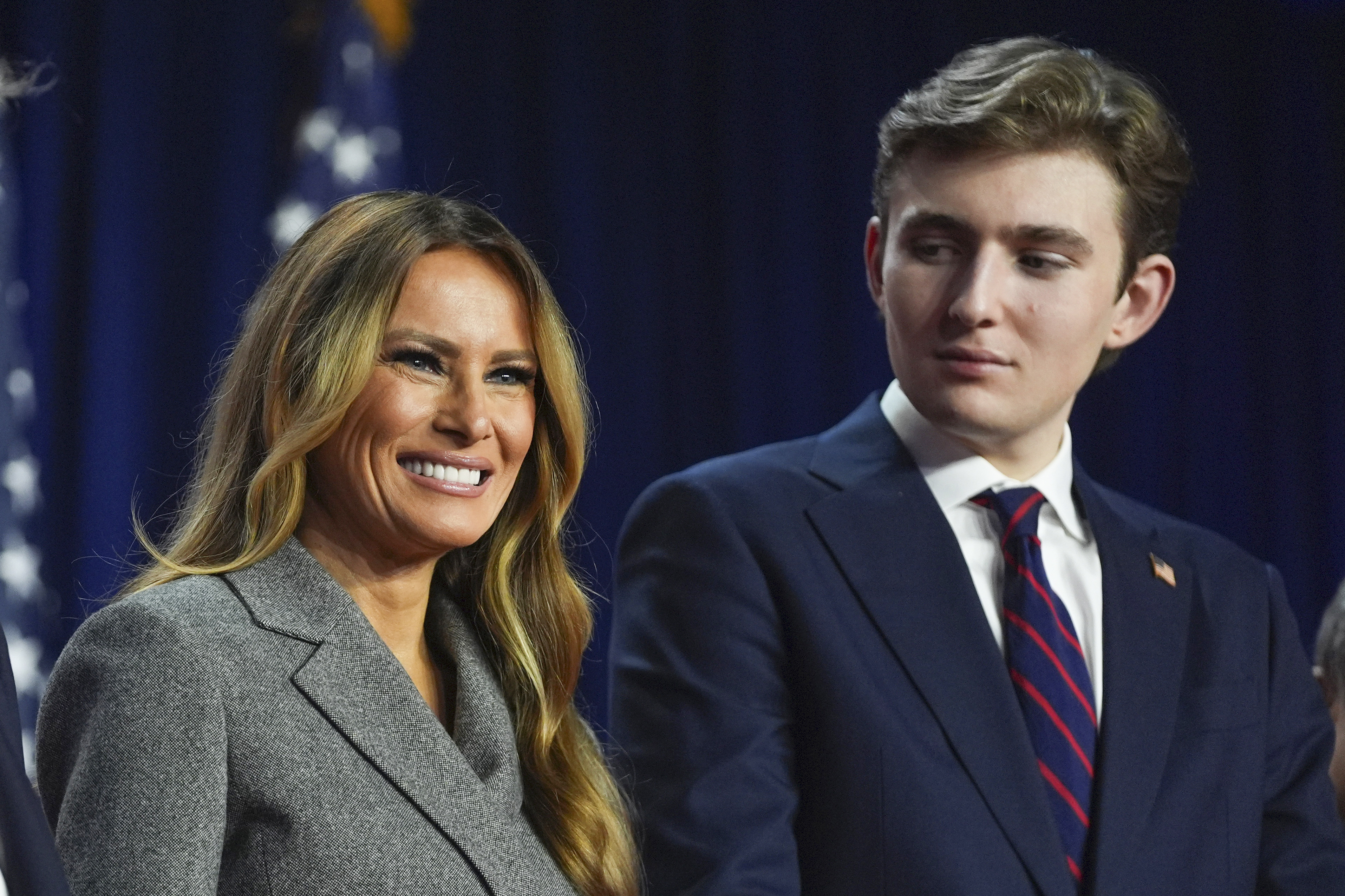 FILE - Former first lady Melania Trump and Barron Trump listen at an election night watch party at the Palm Beach Convention Center, Nov. 6, 2024, in West Palm Beach, Fla. (AP Photo/Evan Vucci, File)