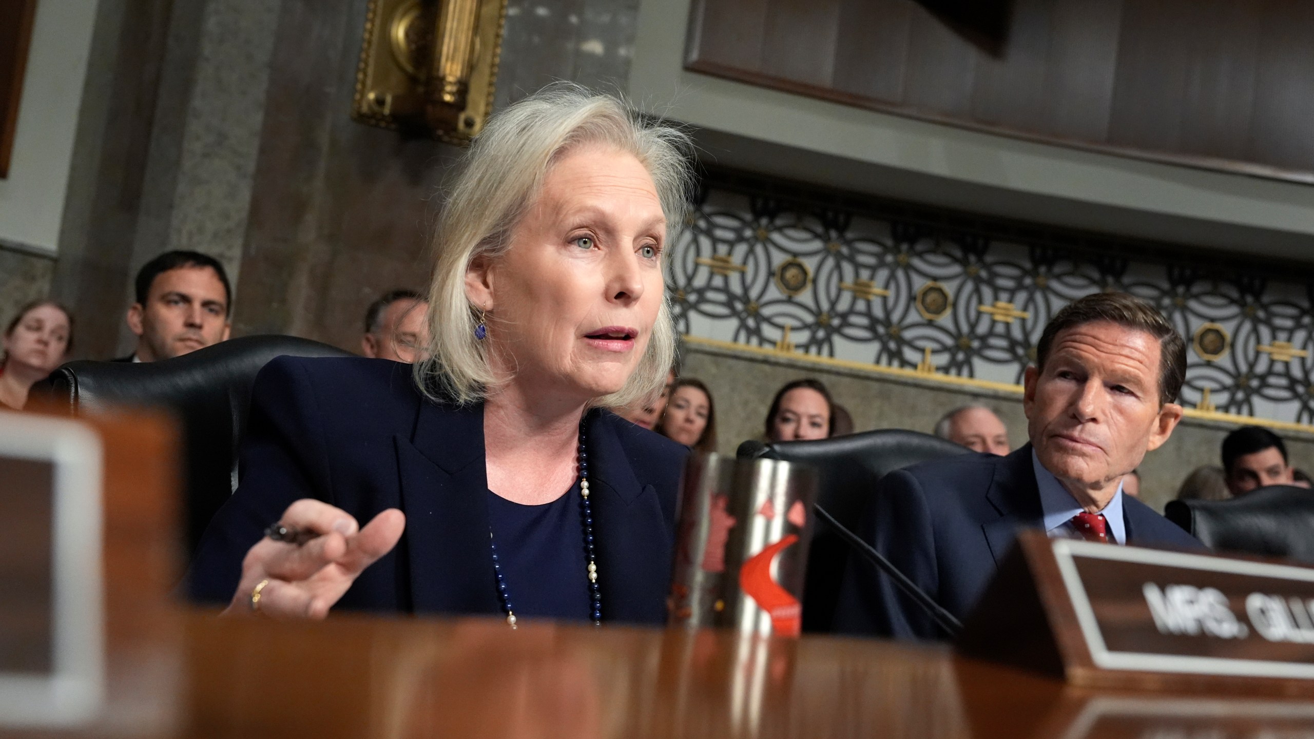 Sen. Kirsten Gillibrand, D-N.Y. speaks as Sen. Richard Blumenthal, D-Conn., right, listens at the Senate Armed Services Committee confirmation hearing for Pete Hegseth, President-elect Donald Trump's choice to be Defense secretary, at the Capitol in Washington, Tuesday, Jan. 14, 2025. (AP Photo/Alex Brandon)