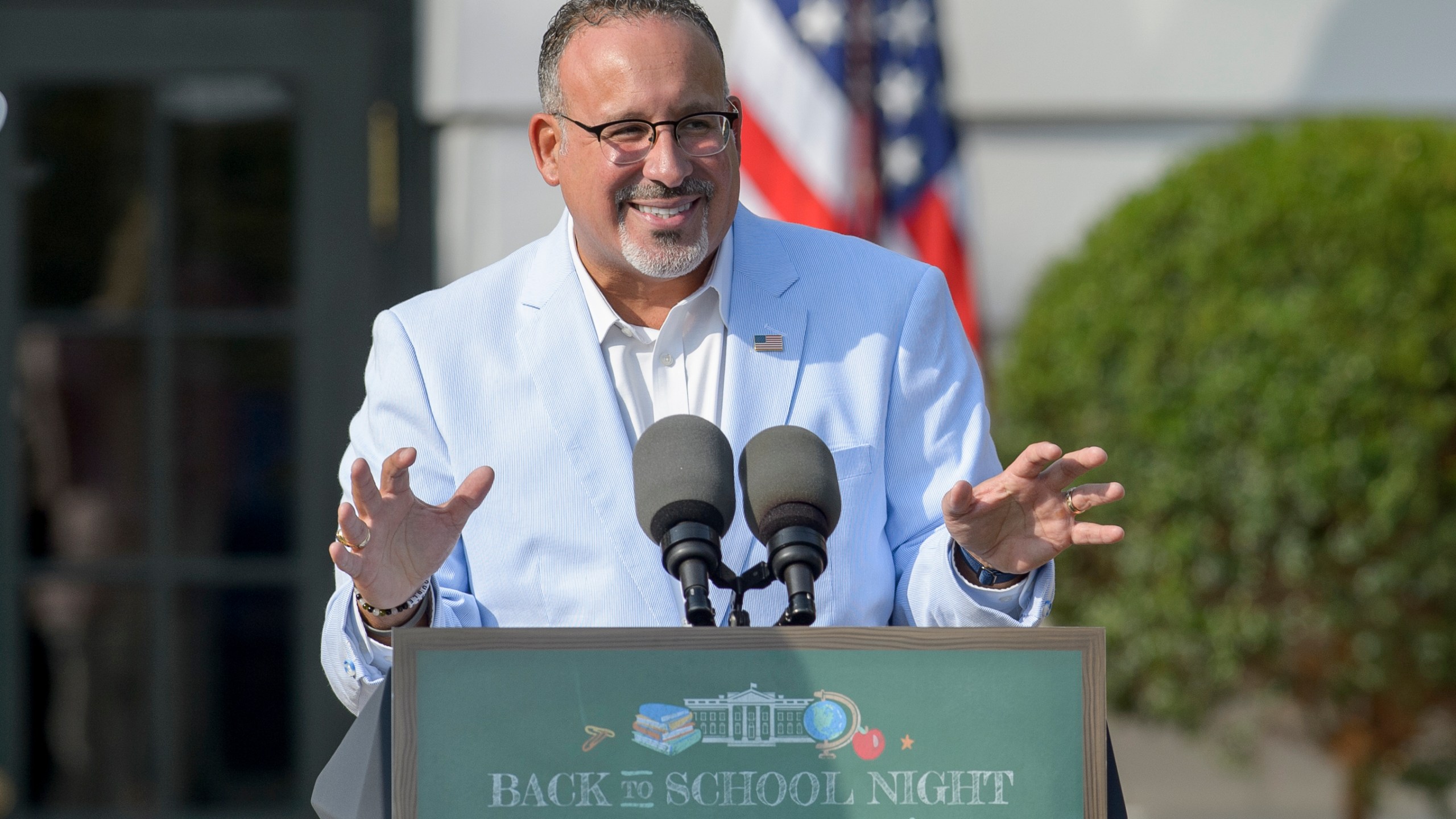 FILE - U.S. Secretary of Education Miguel Cardona offers remarks at the first-ever Back-to-School Night at the White House on the South Lawn of the White House in Washington, Sept. 21, 2024. (AP Photo/Rod Lamkey, Jr., File)