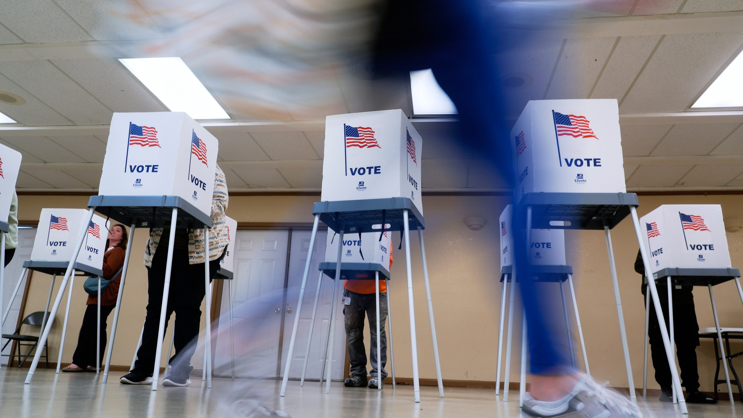 FILE - People vote, Nov. 5, 2024, in Oak Creek, Wis. (AP Photo/Morry Gash, File)