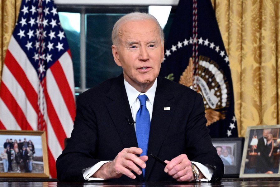 President Joe Biden speaks from the Oval Office of the White House as he gives his farewell address Wednesday, Jan. 15, 2025, in Washington. (Mandel Ngan/Pool via AP)