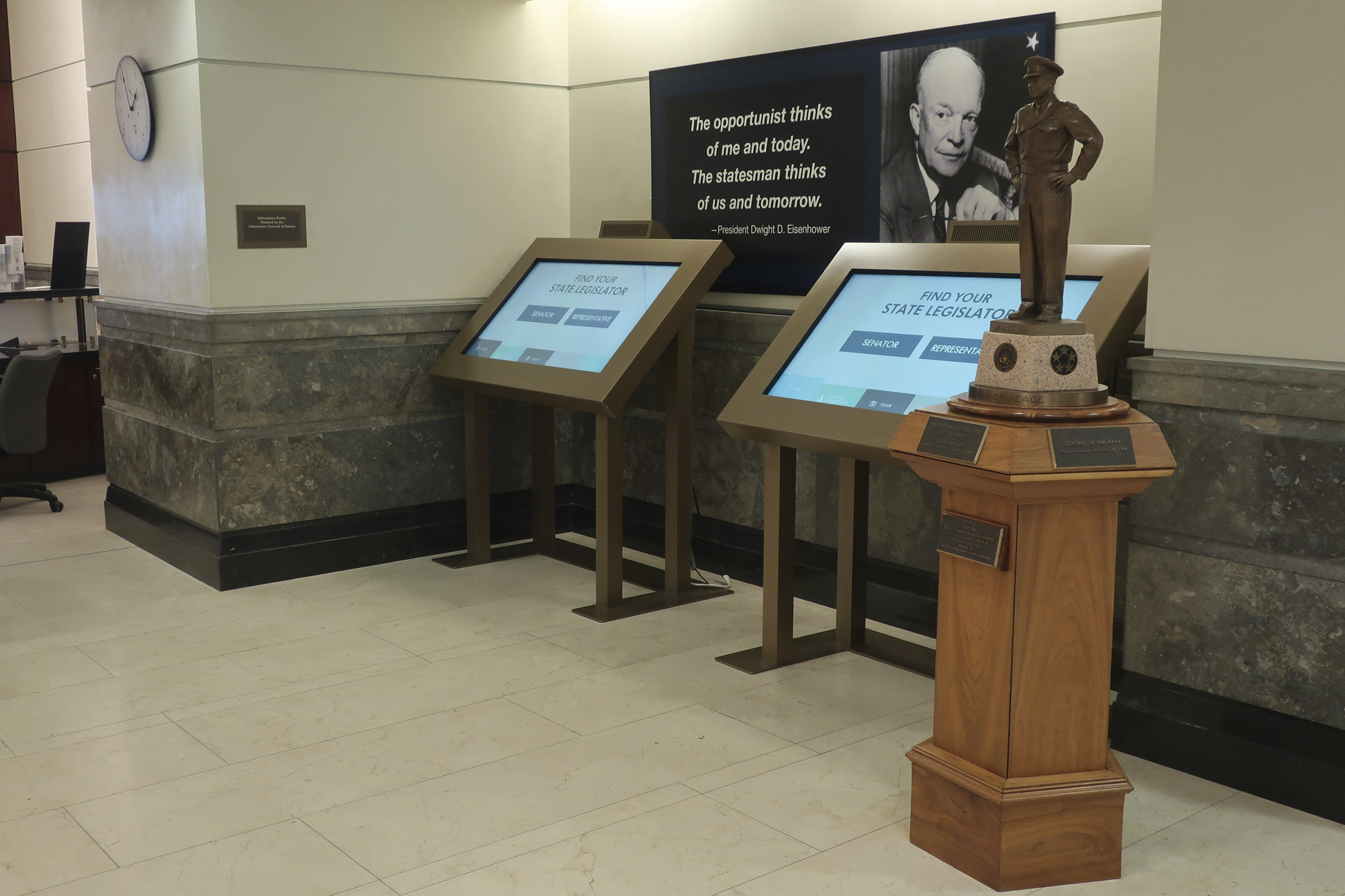 A display in the Visitor Center at the Kansas Statehouse aimed at helping people find their legislators in the building also honors Dwight Eisenhower, both as president and as supreme Allied commander during World War II, Thursday, Feb. 13, 2025, in Topeka, Kansas. (AP Photo/John Hanna)