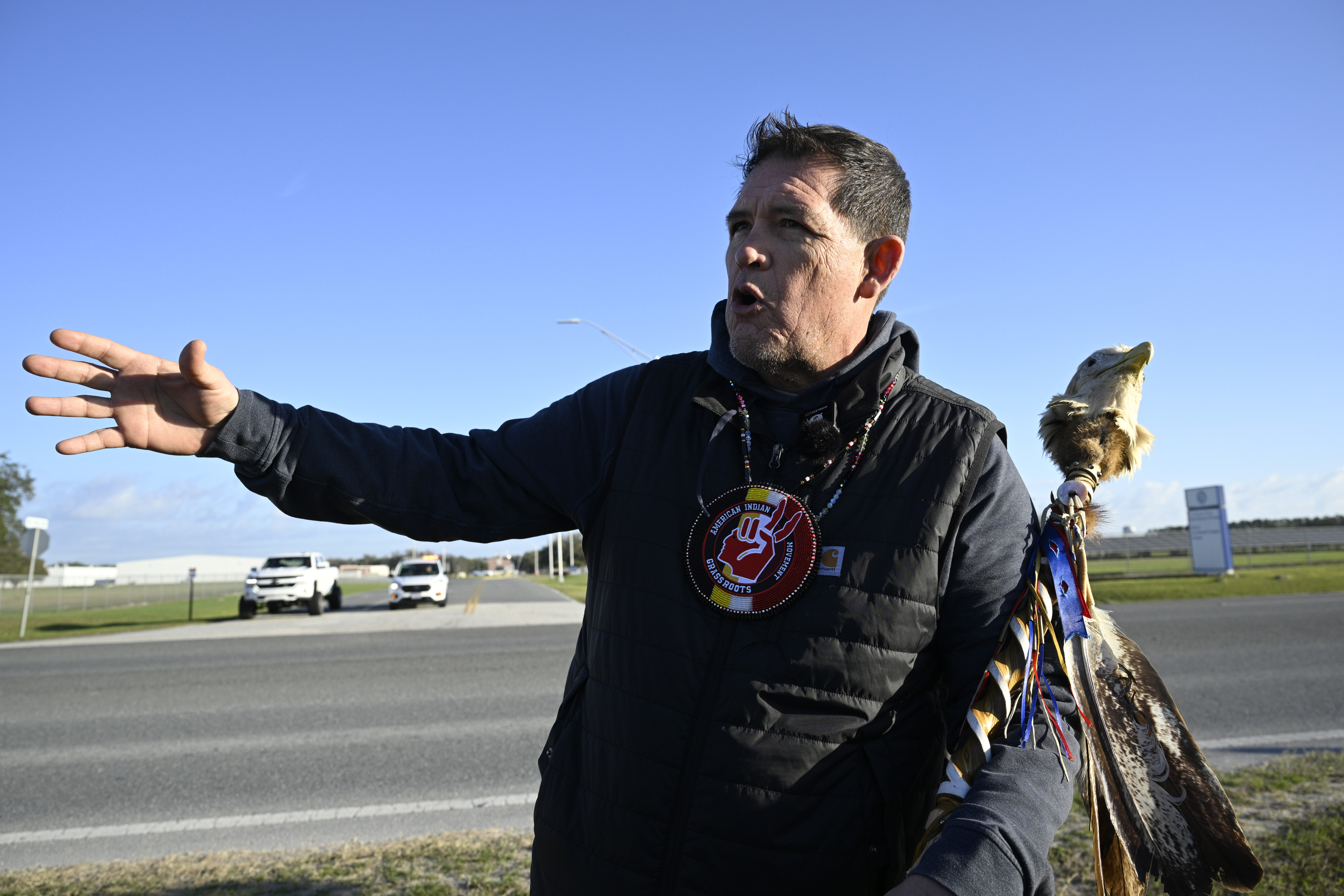 Ray St. Clair, of Minnesota, talks with reporters while standing in front of Federal Correctional Complex, Coleman, while awaiting the release of Leonard Peltier, Tuesday, Feb. 18, 2025, in Sumterville, Fla. (AP Photo/Phelan M. Ebenhack)