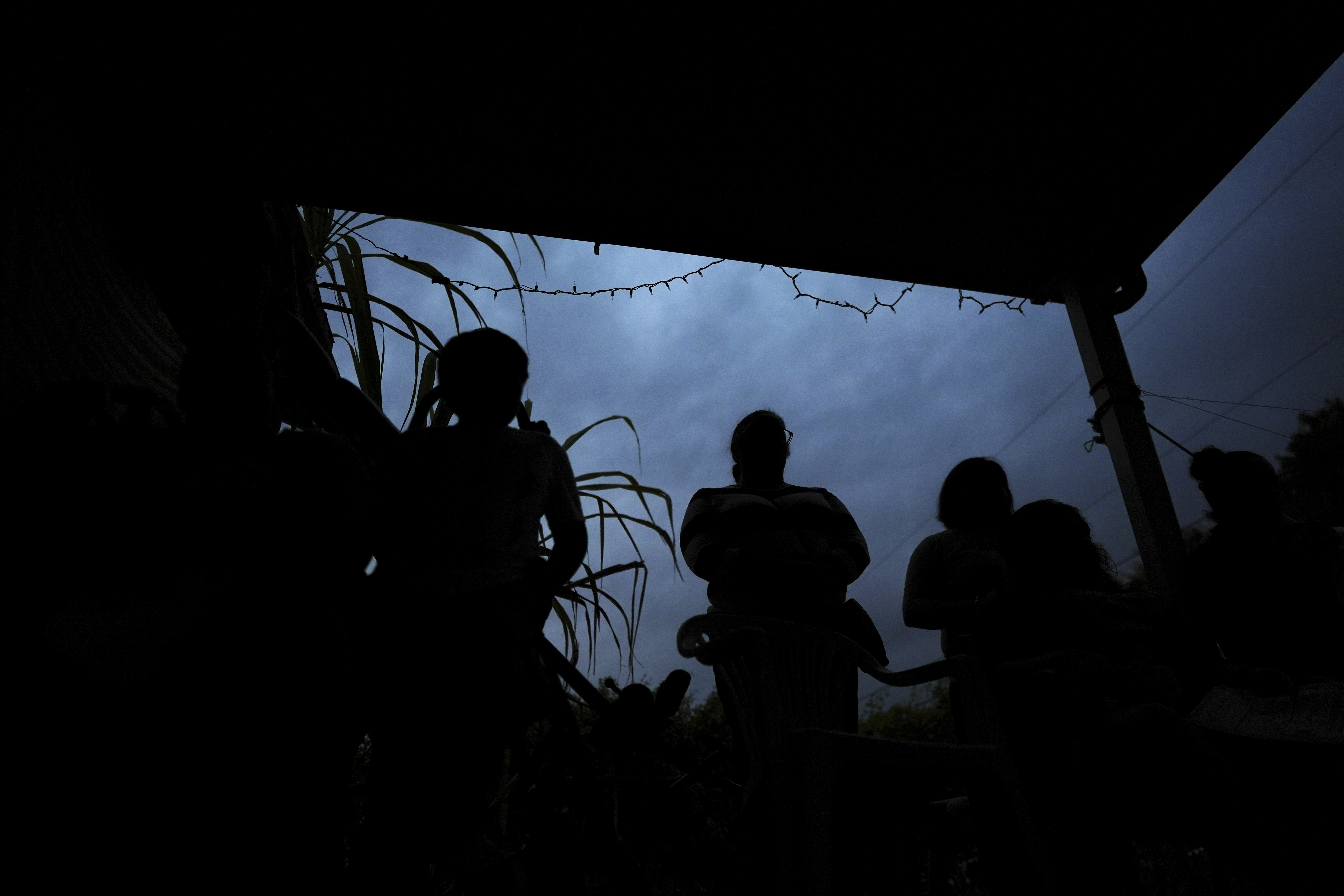 FILE - Women, who are in the U.S. illegally, and their children listen as Nora Sandigo explains their legal rights, as well as options to prepare their families in case a parent were to be detained or deported, in Homestead, Fla., Jan. 17, 2025. (AP Photo/Rebecca Blackwell, File)