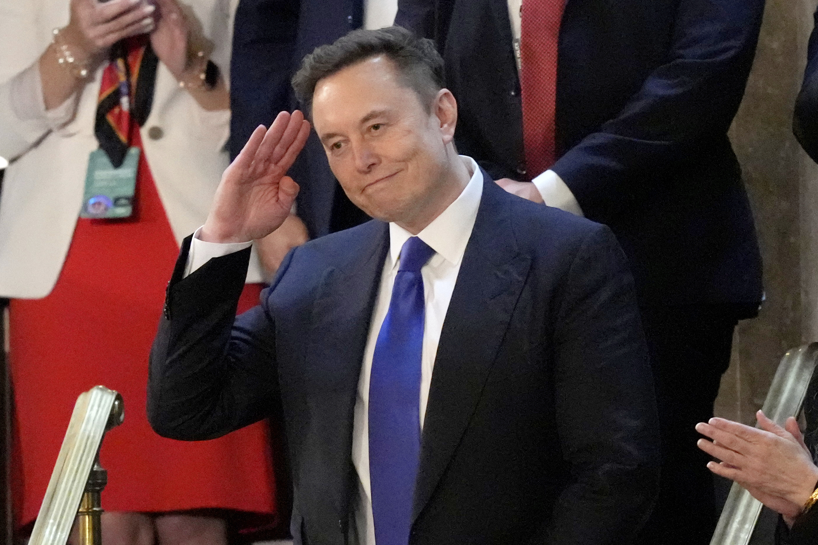 Elon Musk salutes as President Donald Trump addresses a joint session of Congress at the Capitol in Washington, Tuesday, March 4, 2025. (AP Photo/Alex Brandon)