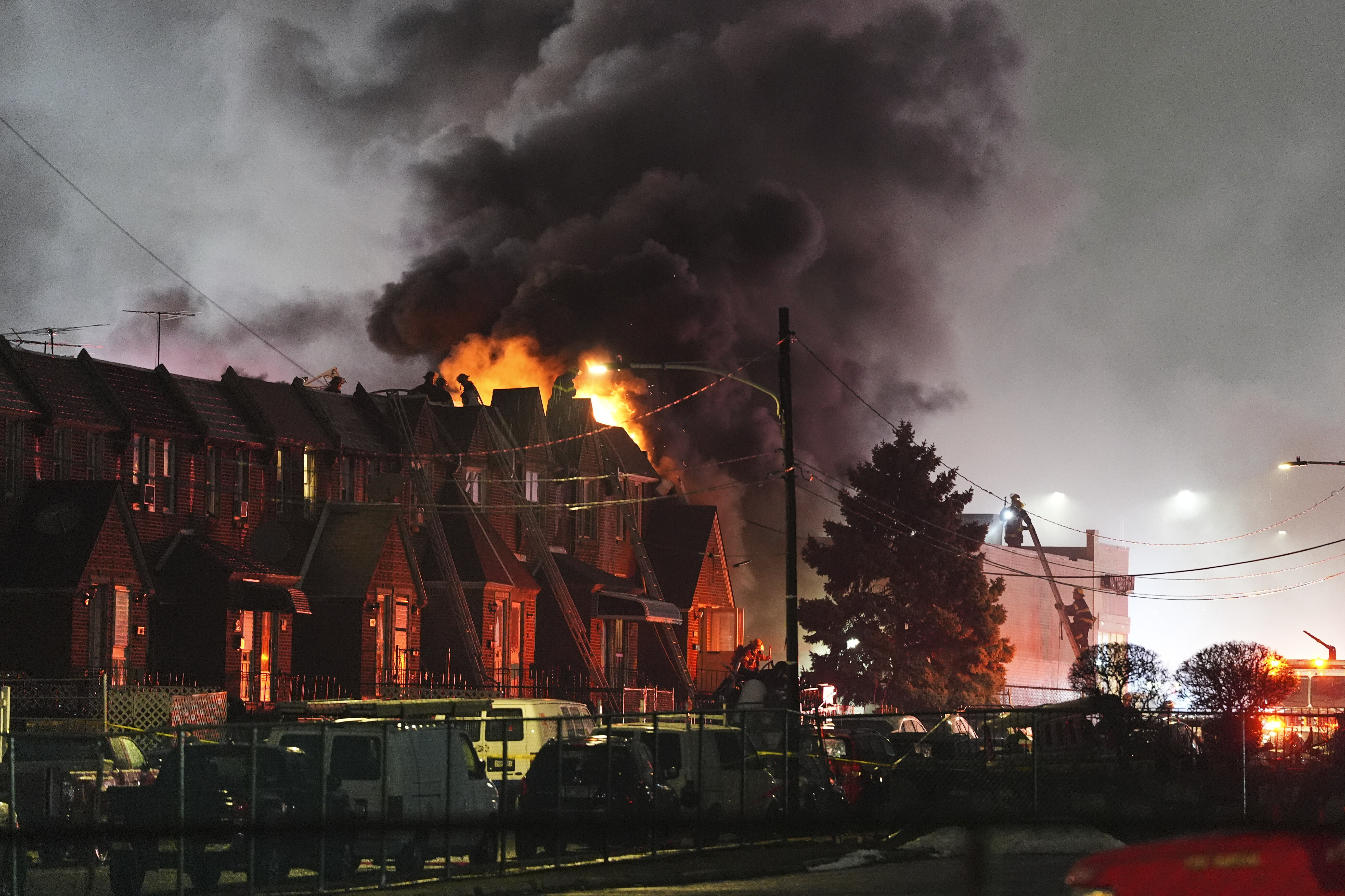 FILE - First responders work at the scene after a small plane crashed in Philadelphia, Friday, Jan. 31, 2025. (AP Photo/Matt Rourke, File)