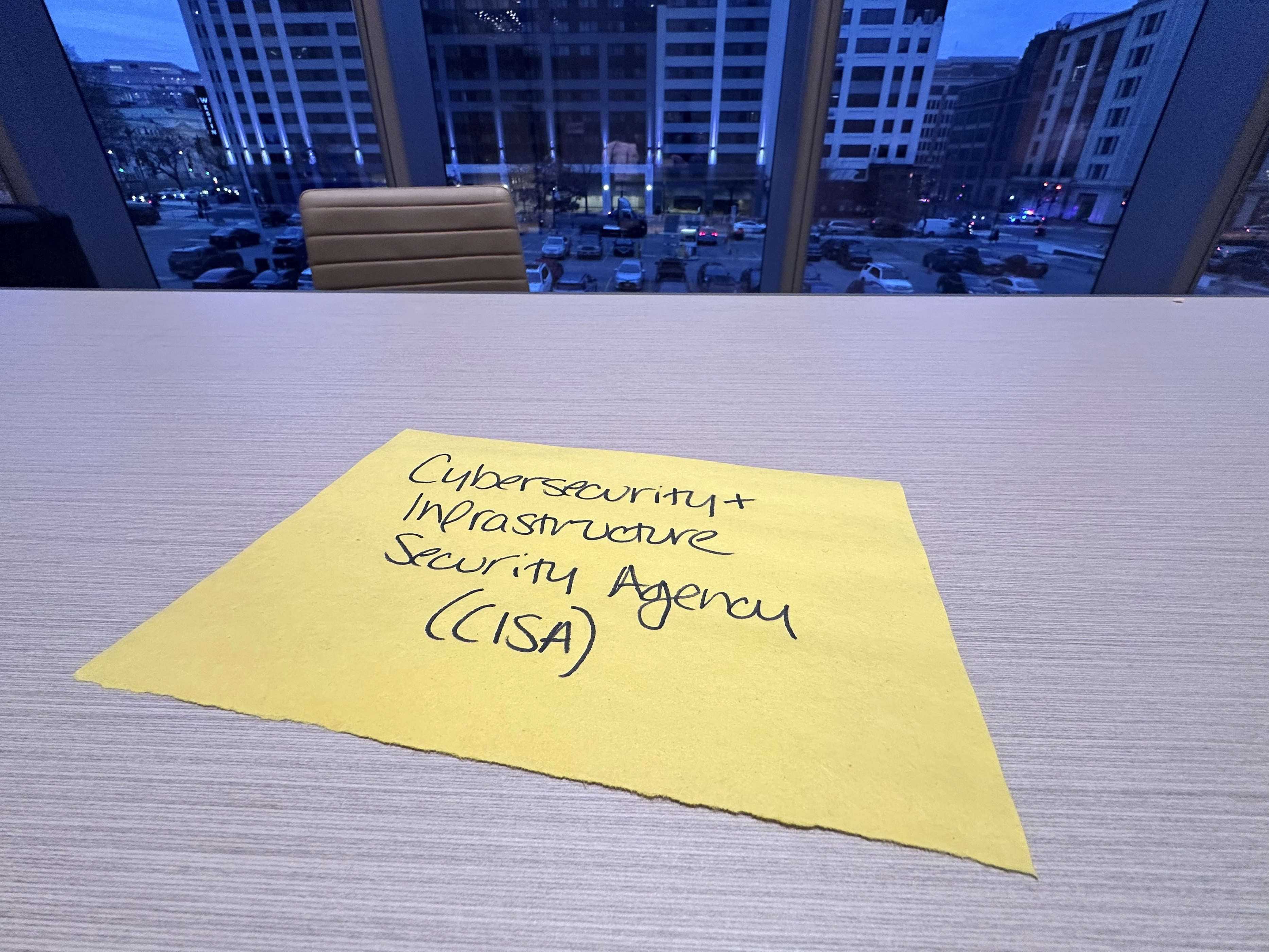 A spot that had been reserved for a representative of the Cybersecurity and Infrastructure Security Agency sits vacant at a meeting of the National Association of State Election Directors in Washington, Feb. 2, 2025. (AP Photo/Christina A. Cassidy)