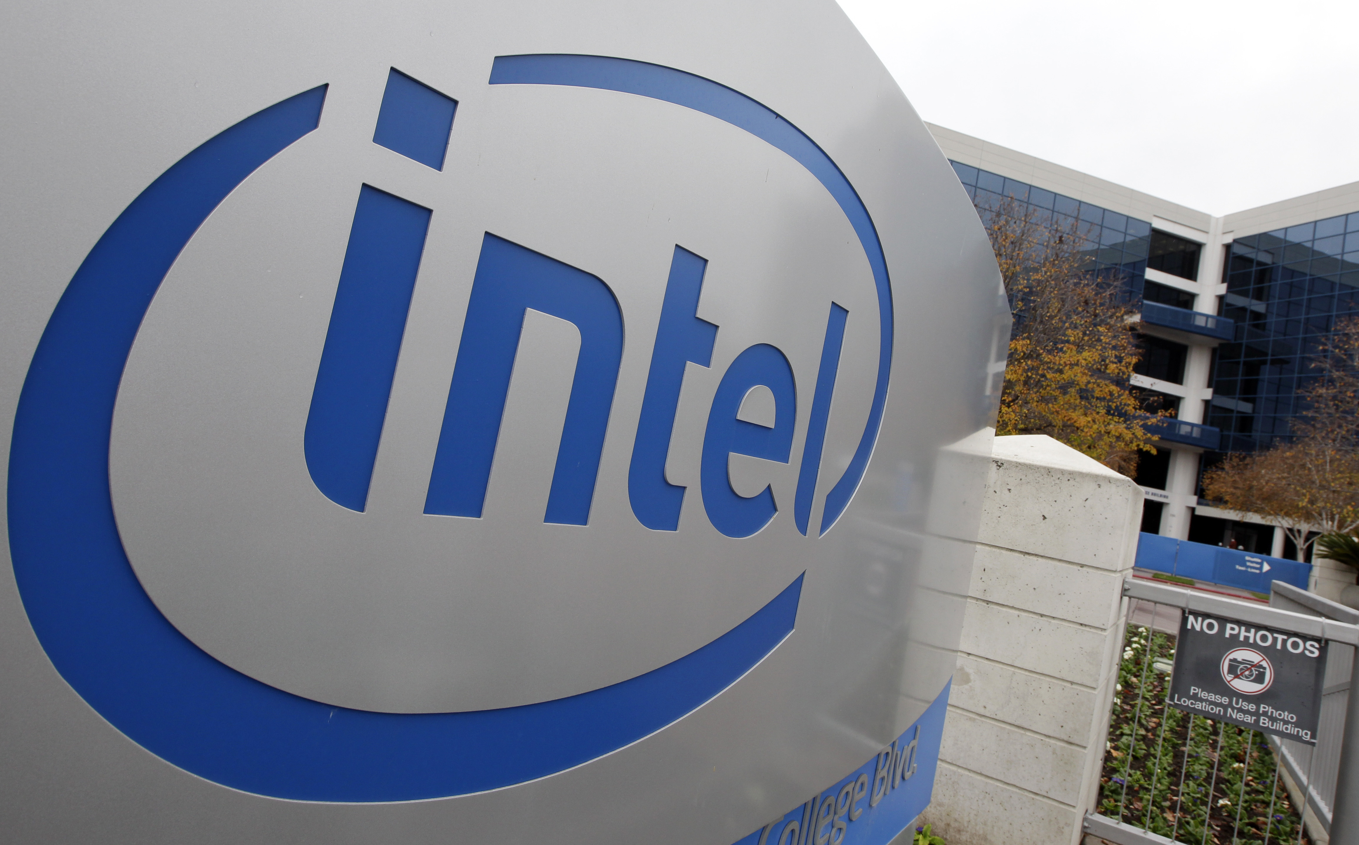 FILE - The Intel sign is shown at Intel headquarters in Santa Clara, Calif., Monday, Dec. 12, 2011. (AP Photo/Paul Sakuma,File)